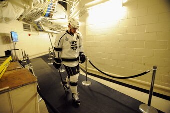 NEW YORK, NY - JUNE 09:  Anze Kopitar #11 of the Los Angeles Kings walks towards the ice before taking on the New York Rangers in Game Three of the 2014 Stanley Cup Final at Madison Square Garden on June 9, 2014 in New York City.  (Photo by Andrew D. Bern