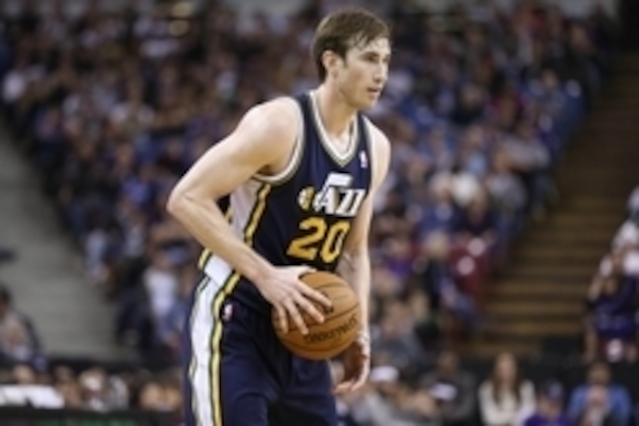 Dec 11, 2013; Sacramento, CA, USA; Utah Jazz shooting guard Gordon Hayward (20) controls the ball against the Sacramento Kings during the third quarter at Sleep Train Arena. The Utah Jazz defeated the Sacramento Kings 122-101. Mandatory Credit: Kelley L C