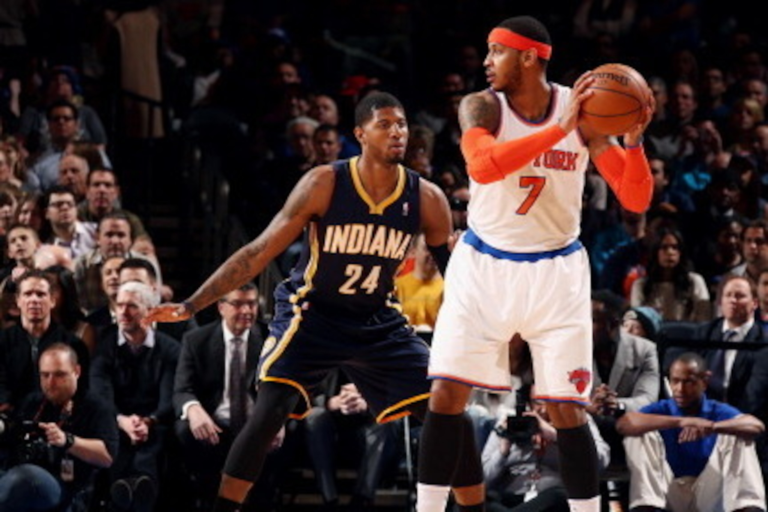 NEW YORK, NY - MARCH 19: Carmelo Anthony #7 of the New York Knicks handles the ball against Paul George #24 of the Indiana Pacers at Madison Square Garden in New York City on March 19, 2014. NOTE TO USER: User expressly acknowledges and agrees that, by d NEW YORK, NY - MARCH 19: Carmelo Anthony #7 of the New York Knicks handles the ball against Paul George #24 of the Indiana Pacers at Madison Square Garden in New York City on March 19, 2014. NOTE TO USER: User expressly acknowledges and agrees that, by d