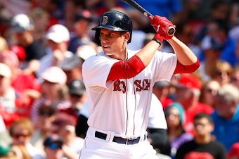 BOSTON, MA - JUNE 01:  Garin Cecchini #70 of the Boston Red Sox stands at bat in his first MLB game against the Tampa Bay Rays during the game at Fenway Park on June 1, 2014 in Boston, Massachusetts.  (Photo by Jared Wickerham/Getty Images)