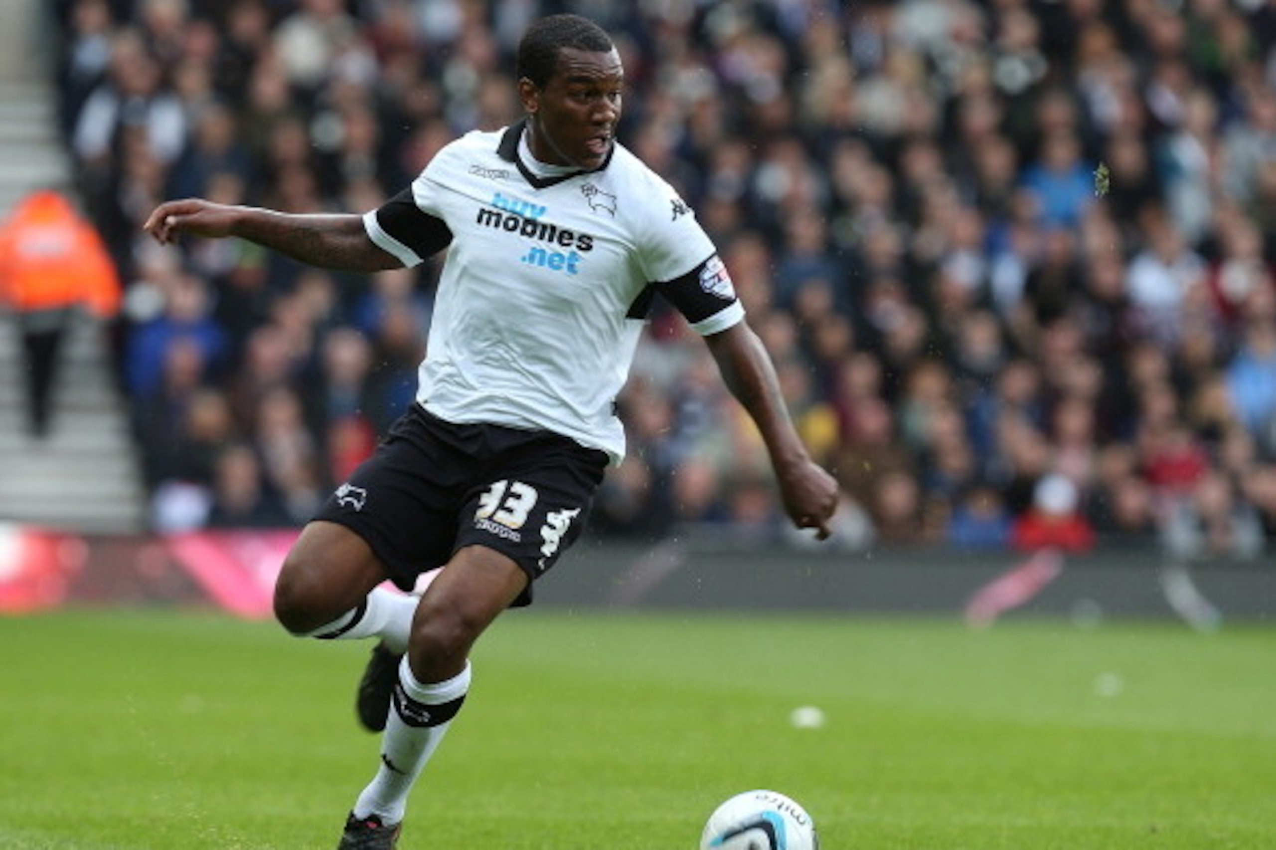 DERBY, ENGLAND - MAY 11:  Andre Wisdom of Derby County in action during the Sky Bet Championship Semi Final Second Leg between Derby County and Brighton & Hove Albion at iPro Stadium on May 11, 2014 in Derby, England.  (Photo by Pete Norton/Getty Images)