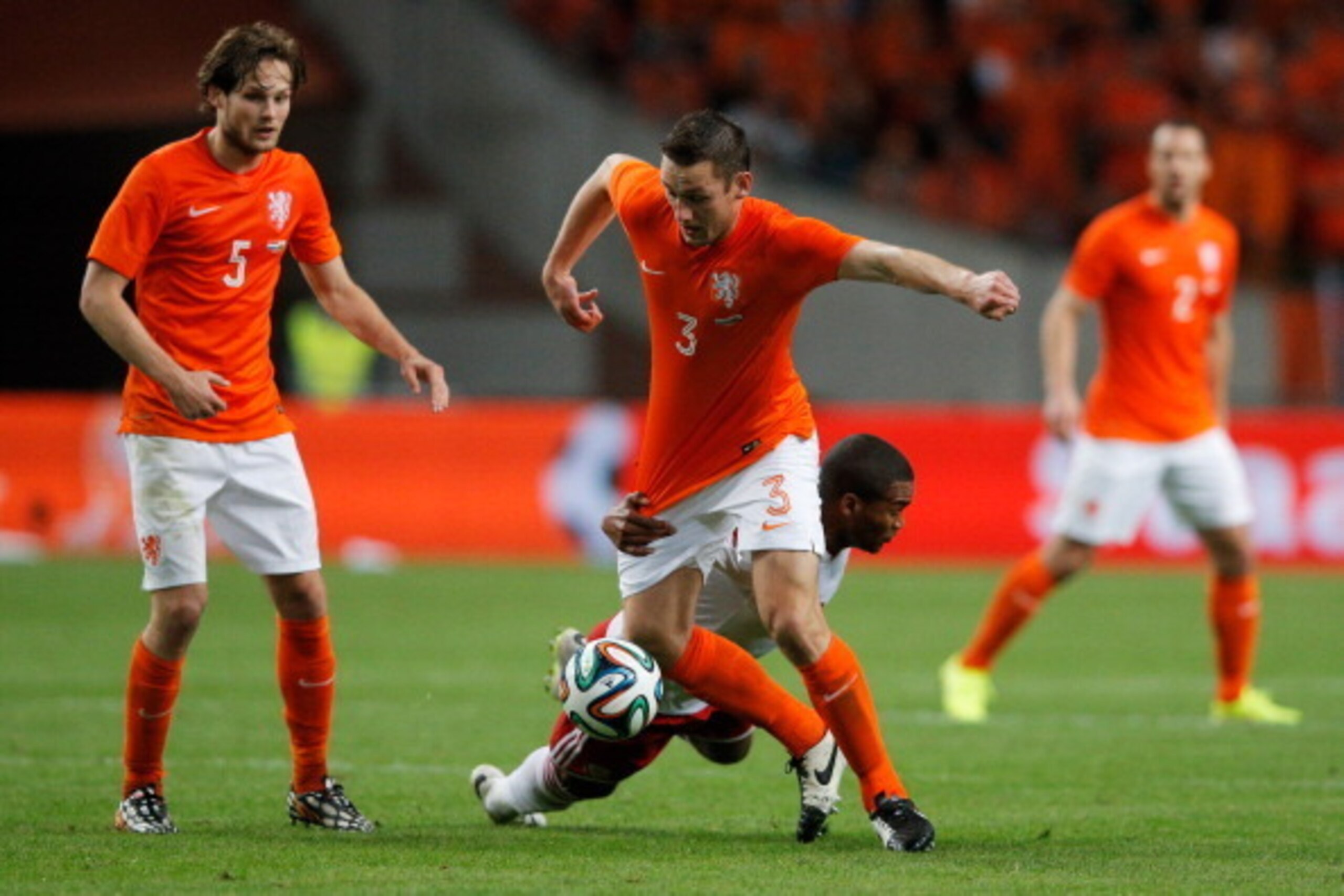 AMSTERDAM, NETHERLANDS - JUNE 04: Stefan de Vrij of Netherlands and Jermaine Easter of Wales battle for the ball during the International Friendly match between The Netherlands and Wales at Amsterdam Arena on June 4, 2014 in Amsterdam, Netherlands. (Pho AMSTERDAM, NETHERLANDS - JUNE 04: Stefan de Vrij of Netherlands and Jermaine Easter of Wales battle for the ball during the International Friendly match between The Netherlands and Wales at Amsterdam Arena on June 4, 2014 in Amsterdam, Netherlands. (Pho