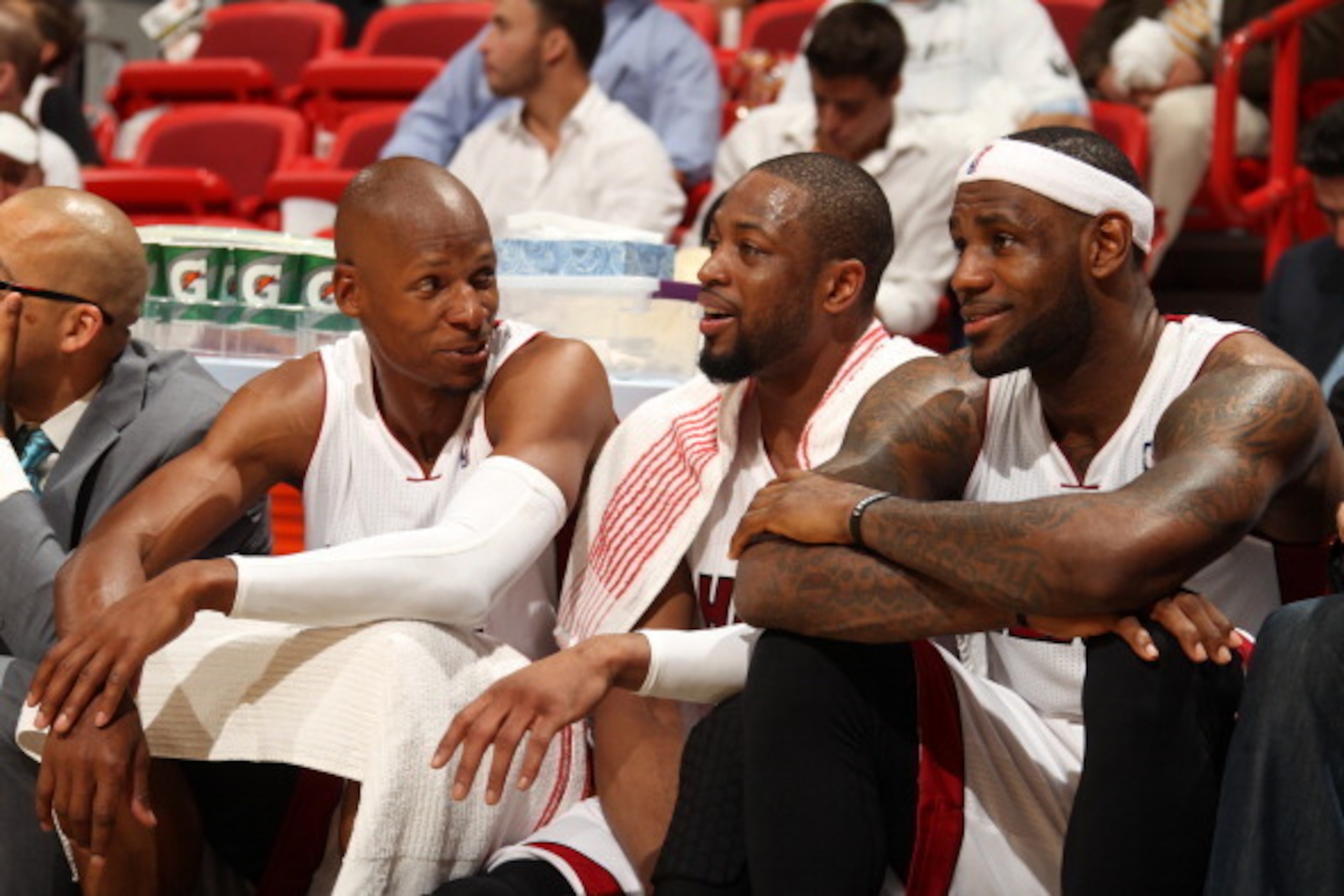 MIAMI, FL - MAY 6: Ray Allen #34, Dwyane Wade #3, and LeBron James #6 of the Miami Heat look on from the bench in Game One of the Eastern Conference Semi-Finals against the Brooklyn Nets during the 2014 NBA Playoffs at American Airlines Arena on May 6, 20