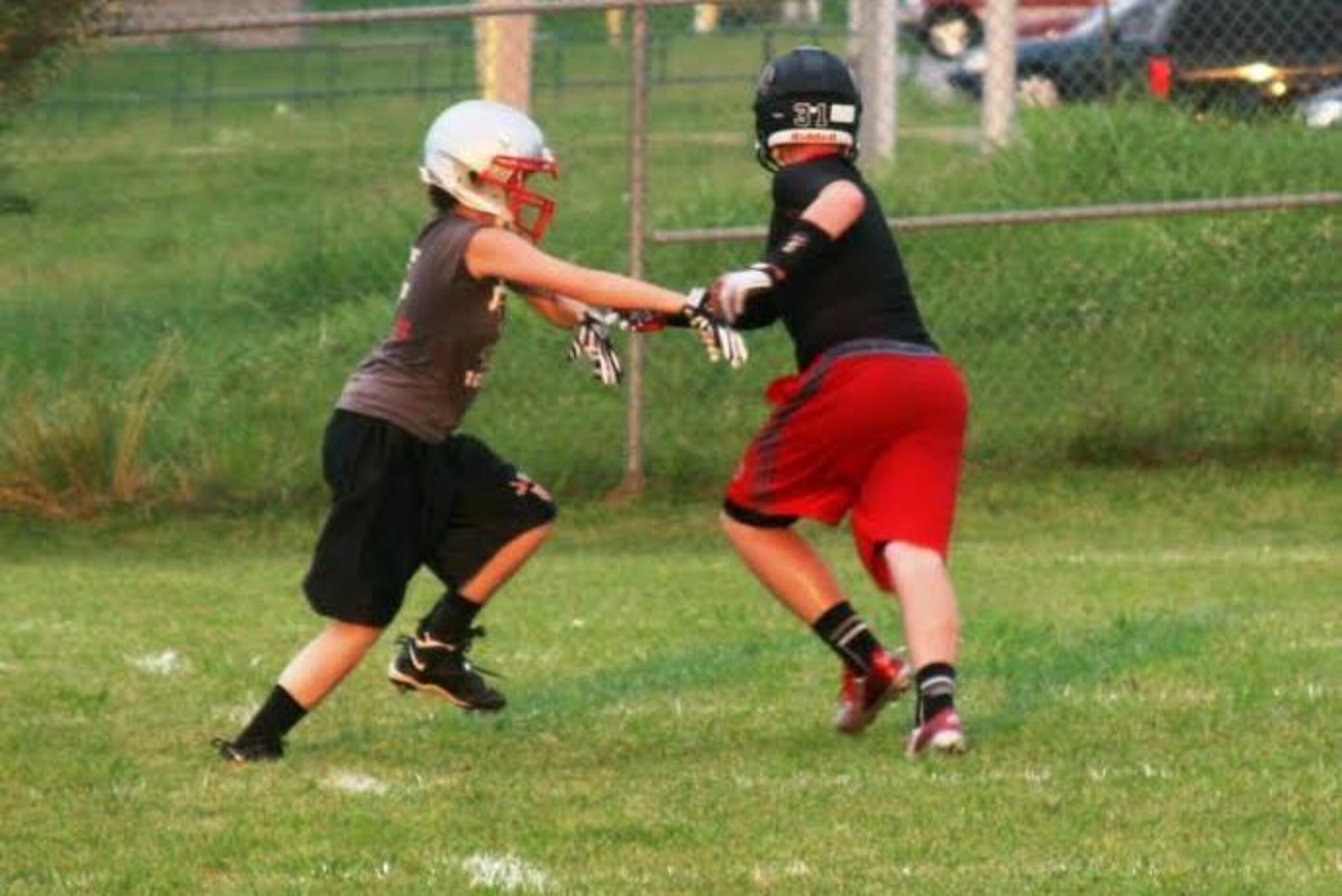 Osborne, left, has come a long way since first strapping on a helmet last year.