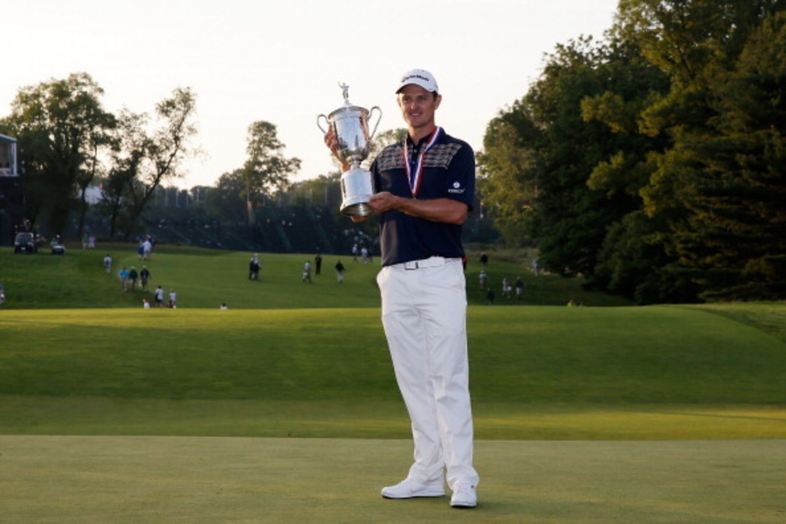 ARDMORE, PA - JUNE 16:  Justin Rose of England celebrates with the U.S. Open trophy after winning the 113th U.S. Open at Merion Golf Club on June 16, 2013 in Ardmore, Pennsylvania.  (Photo by Rob Carr/Getty Images)