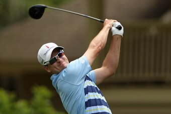 HILTON HEAD ISLAND, SC - APRIL 17: Zach Johnson hits a tee shot on the 8th hole during the first round of the RBC Heritage at Harbour Town Golf Links on April 17, 2014 in Hilton Head Island, South Carolina.  (Photo by Tyler Lecka/Getty Images)