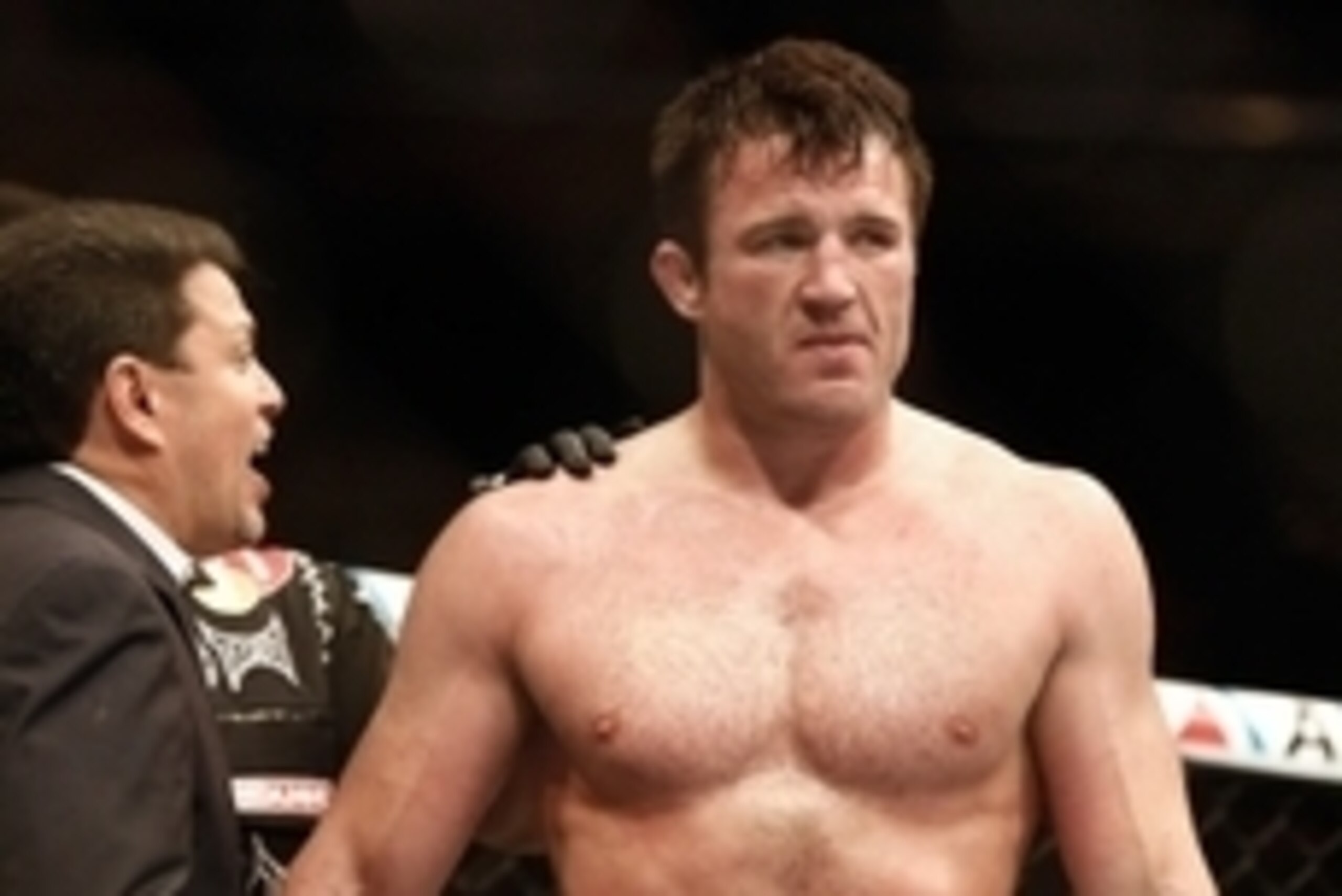 Aug 17, 2013; Boston, MA, USA; Chael Sonnen is congratulated after defeating Shogun Rua during a UFC Light Heavyweight match at the TD Garden.  Sonnen won in one round by a knockout. Mandatory Credit: Winslow Townson-USA TODAY Sports
