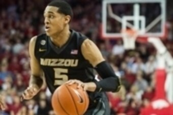 Jan 28, 2014; Fayetteville, AR, USA; Missouri Tigers guard Jordan Clarkson (5) dribbles during a game against the Arkansas Razorbacks at Bud Walton Arena. Missouri defeated Arkansas 75-71. Mandatory Credit: Beth Hall-USA TODAY Sports