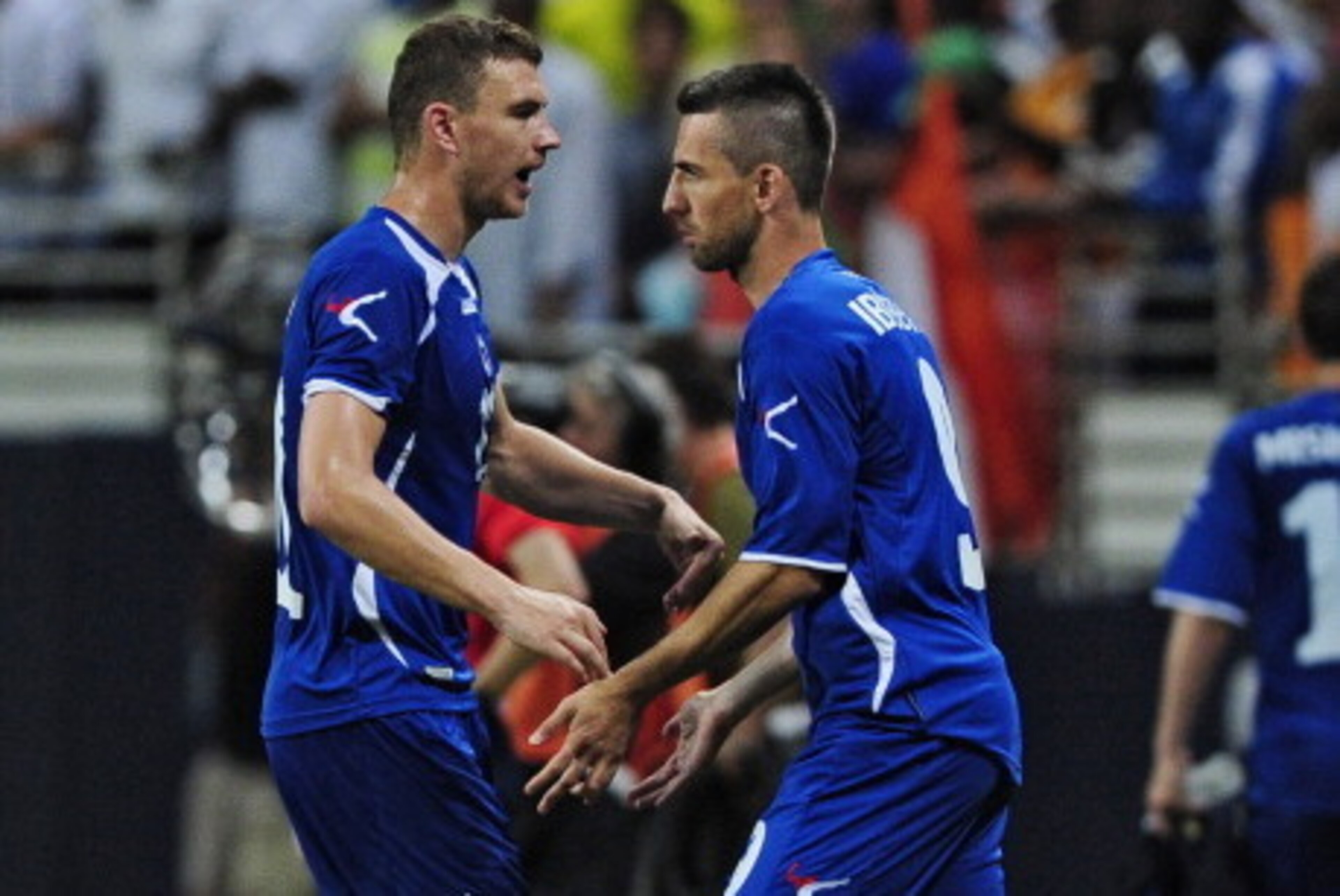 ST. LOUIS, MO - MAY 30: Edin Dzeko #11 of the Bosnia-Herzegovina is replaced by Vedad Ibisevic #9 during the second half of a friendly match against Ivory Coast at Edward Jones Dome on May 30, 2014 in St. Louis, Missouri. Bosnia-Herzegovina defeated the I