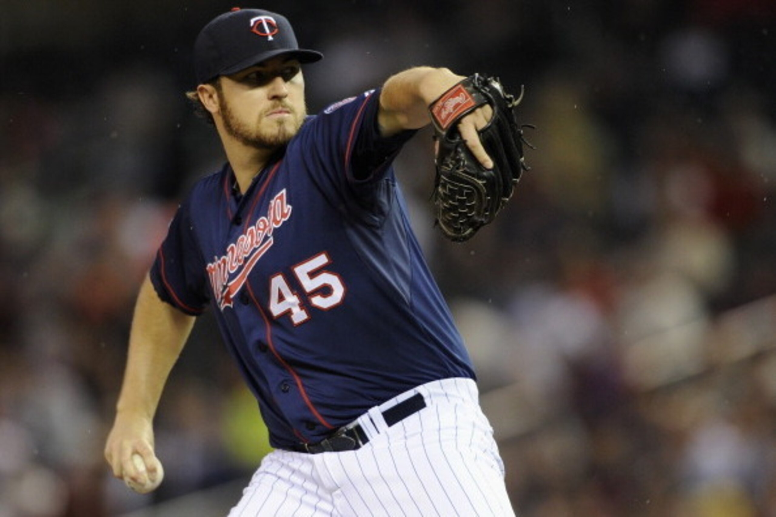 MINNEAPOLIS, MN - JUNE 6: Phil Hughes #45 of the Minnesota Twins delivers a pitch against the Houston Astros during the first inning of the game on June 6, 2014 at Target Field in Minneapolis, Minnesota. (Photo by Hannah Foslien/Getty Images)