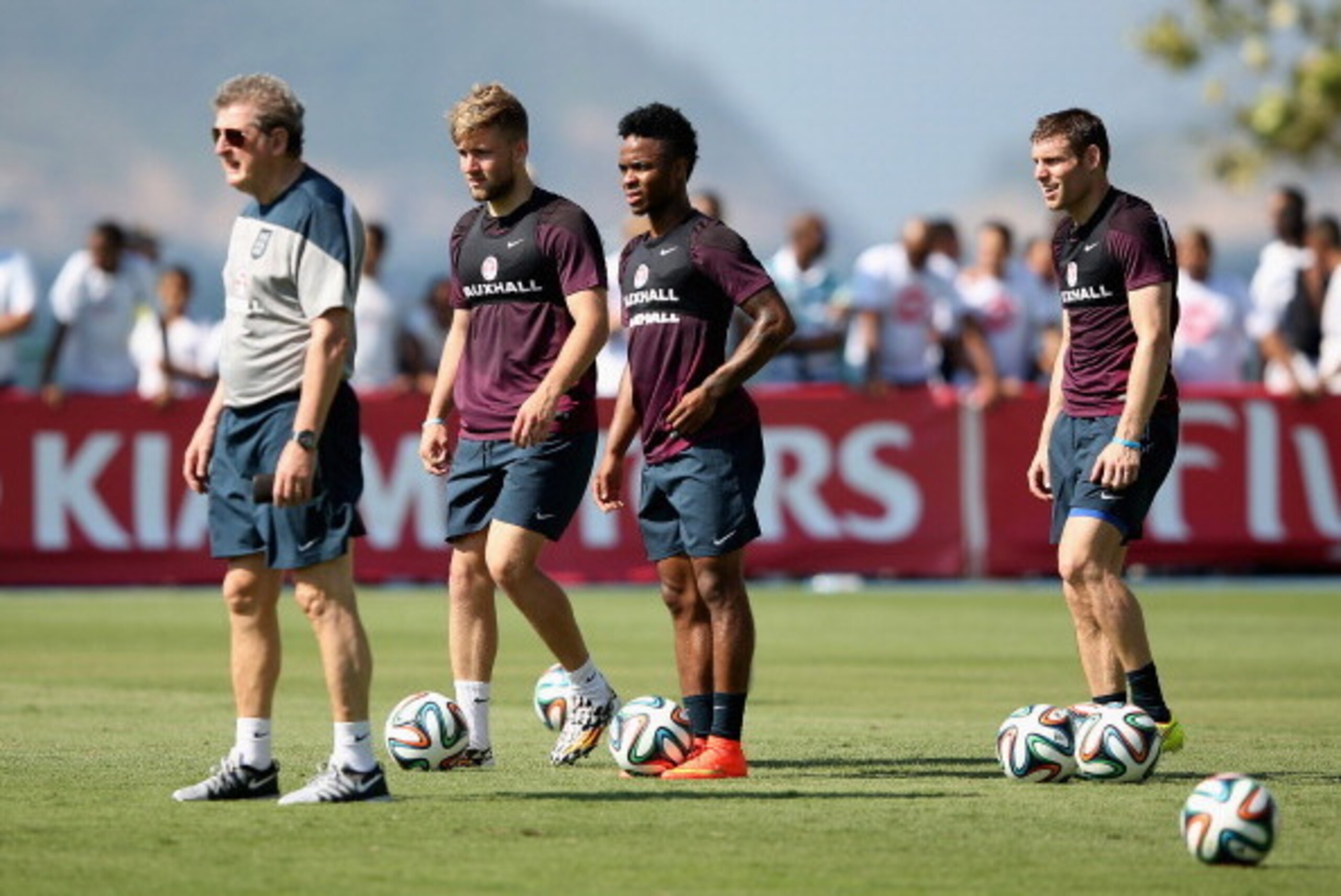 RIO DE JANEIRO, BRAZIL - JUNE 09:  (L-R) Roy Hodgson, Manager of England, Luke Shaw of England, Raheem Sterling of England and James Milner of England during a training session at the Urca military base (Forte de Urca) training ground on June 9, 2014 in R