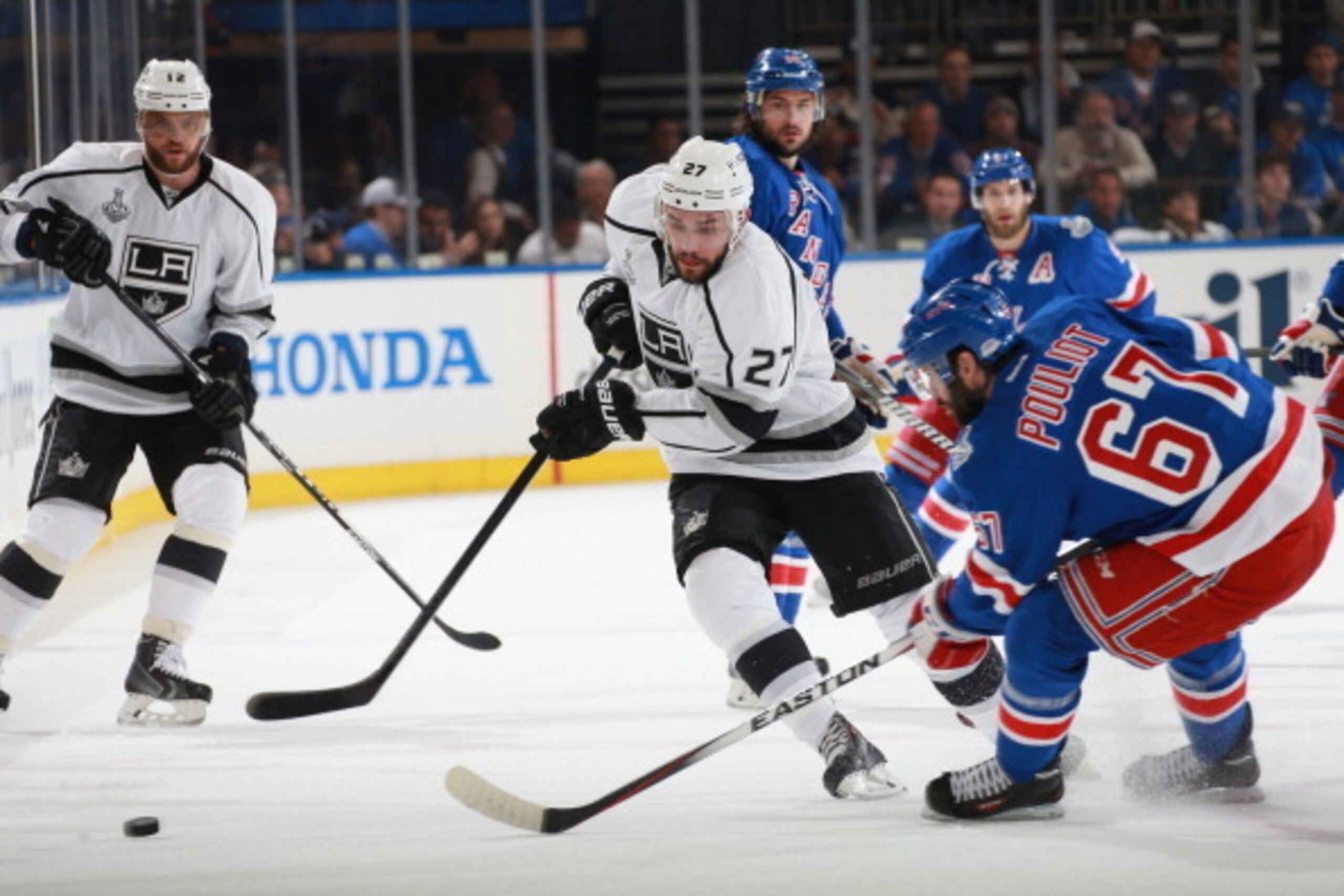 NEW YORK, NY - JUNE 09:  Alec Martinez #27 of the Los Angeles Kings tries to get through traffic in the first period of Game Three of the 2014 Stanley Cup Final at Madison Square Garden on June 9, 2014 in New York City.  (Photo by Dave Sandford/NHLI via G