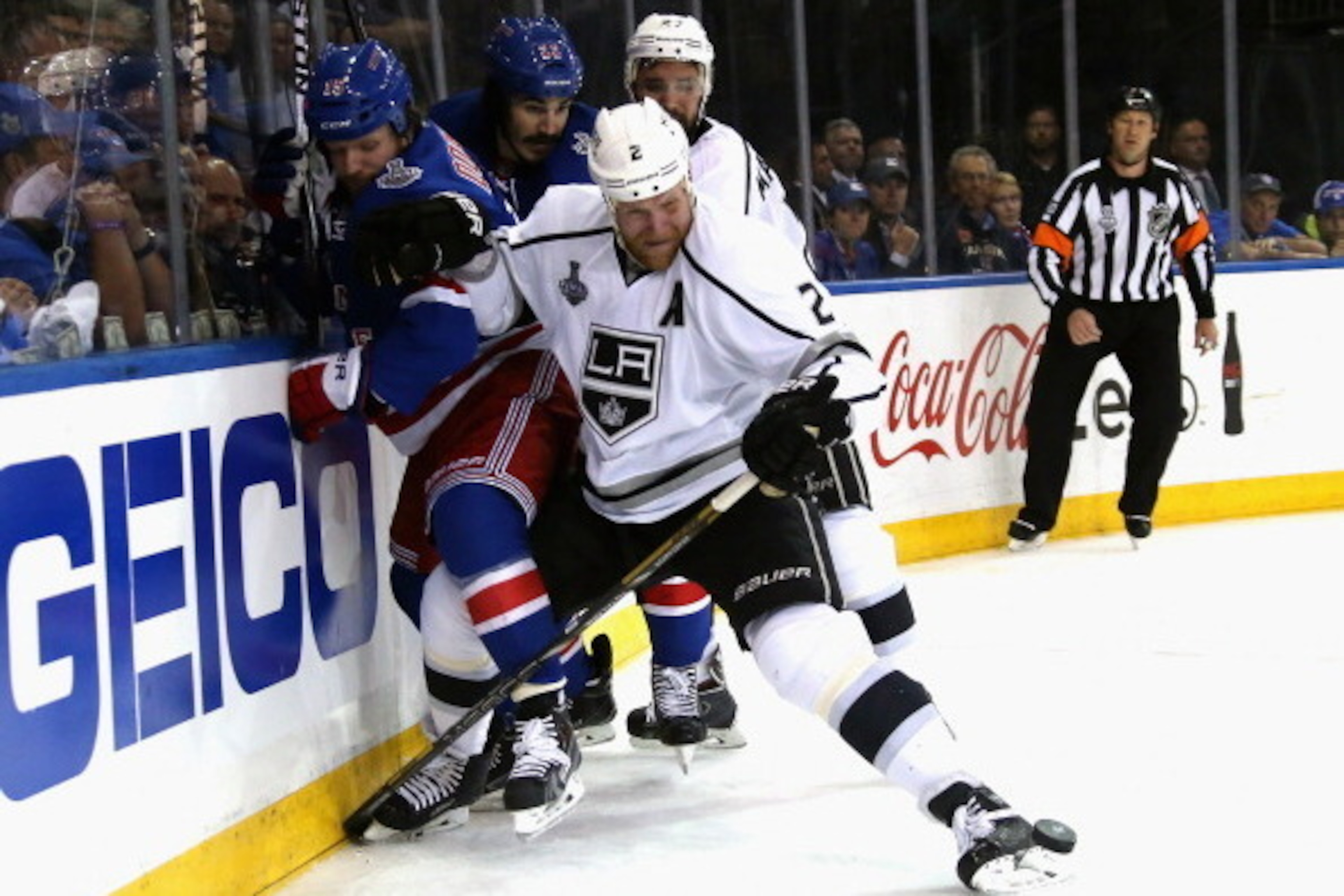 NEW YORK, NY - JUNE 09:  Matt Greene #2 of the Los Angeles Kings checks Derek Dorsett #15 of the New York Rangers during the second period of Game Three of the 2014 NHL Stanley Cup Final at Madison Square Garden on June 9, 2014 in New York, New York.  (Ph