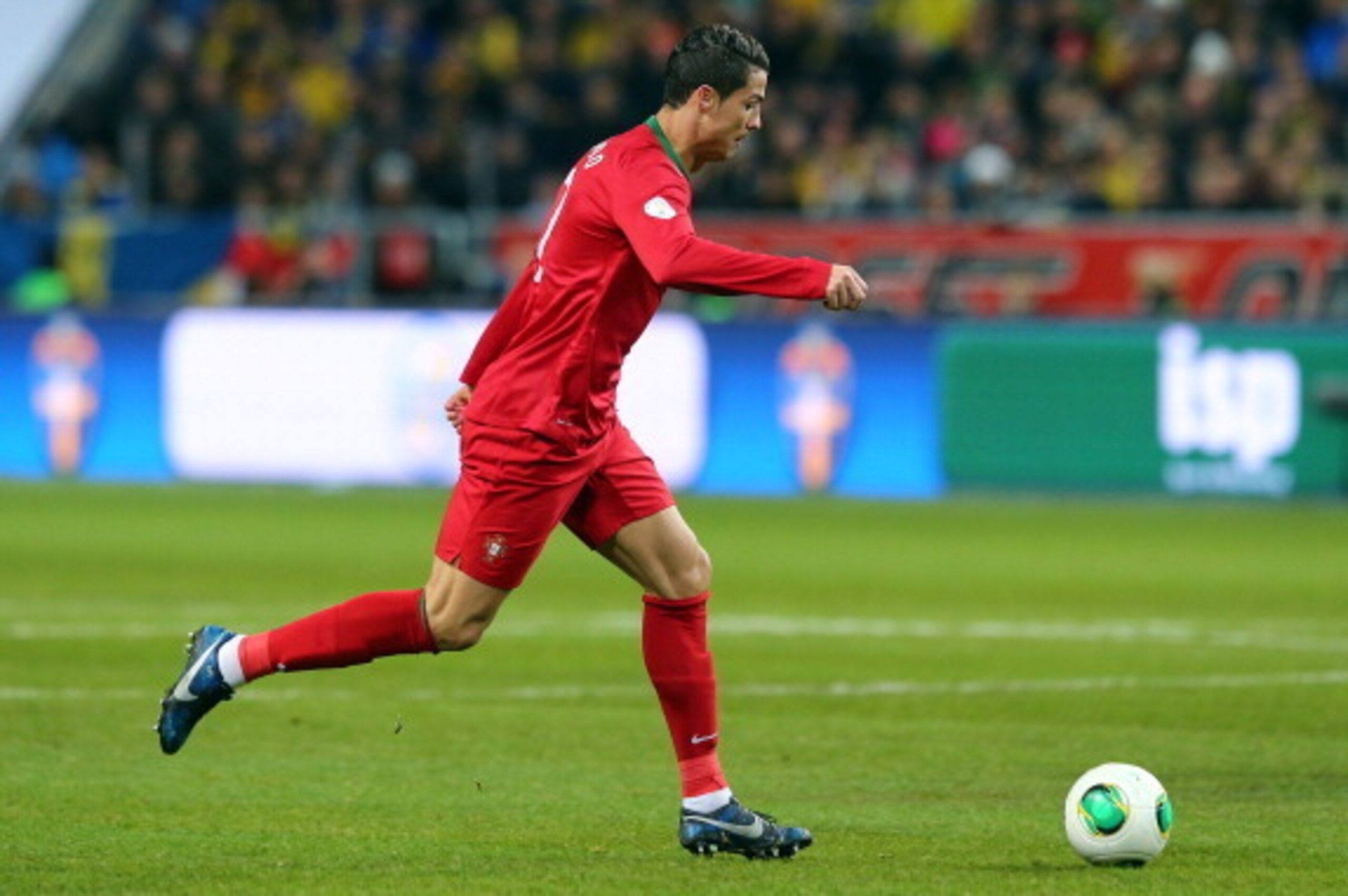 STOCKHOLM, SWEDEN - NOVEMBER 19:  Cristiano Ronaldo of Portugal runs with the ball during the FIFA 2014 World Cup Qualifier Play-off Second Leg match between Sweden and Portugal at Friends Arena on November 19, 2013 in Stockholm, Sweden.  (Photo by Martin