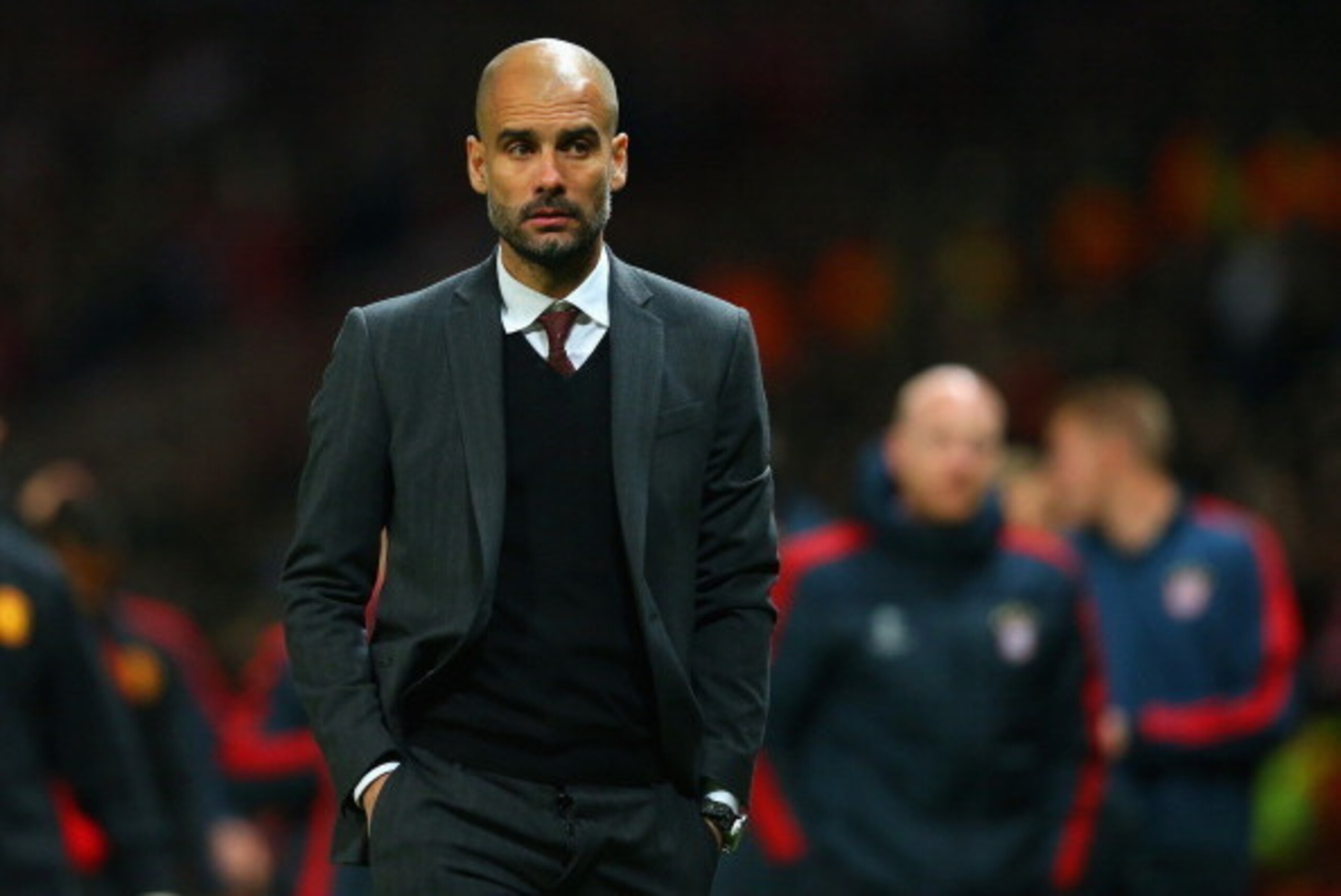 MANCHESTER, ENGLAND - APRIL 01:  Pep Guardiola head coach of Bayern Muenchen at the end of match during the UEFA Champions League Quarter Final first leg match between Manchester United and FC Bayern Muenchen at Old Trafford on April 1, 2014 in Manchester
