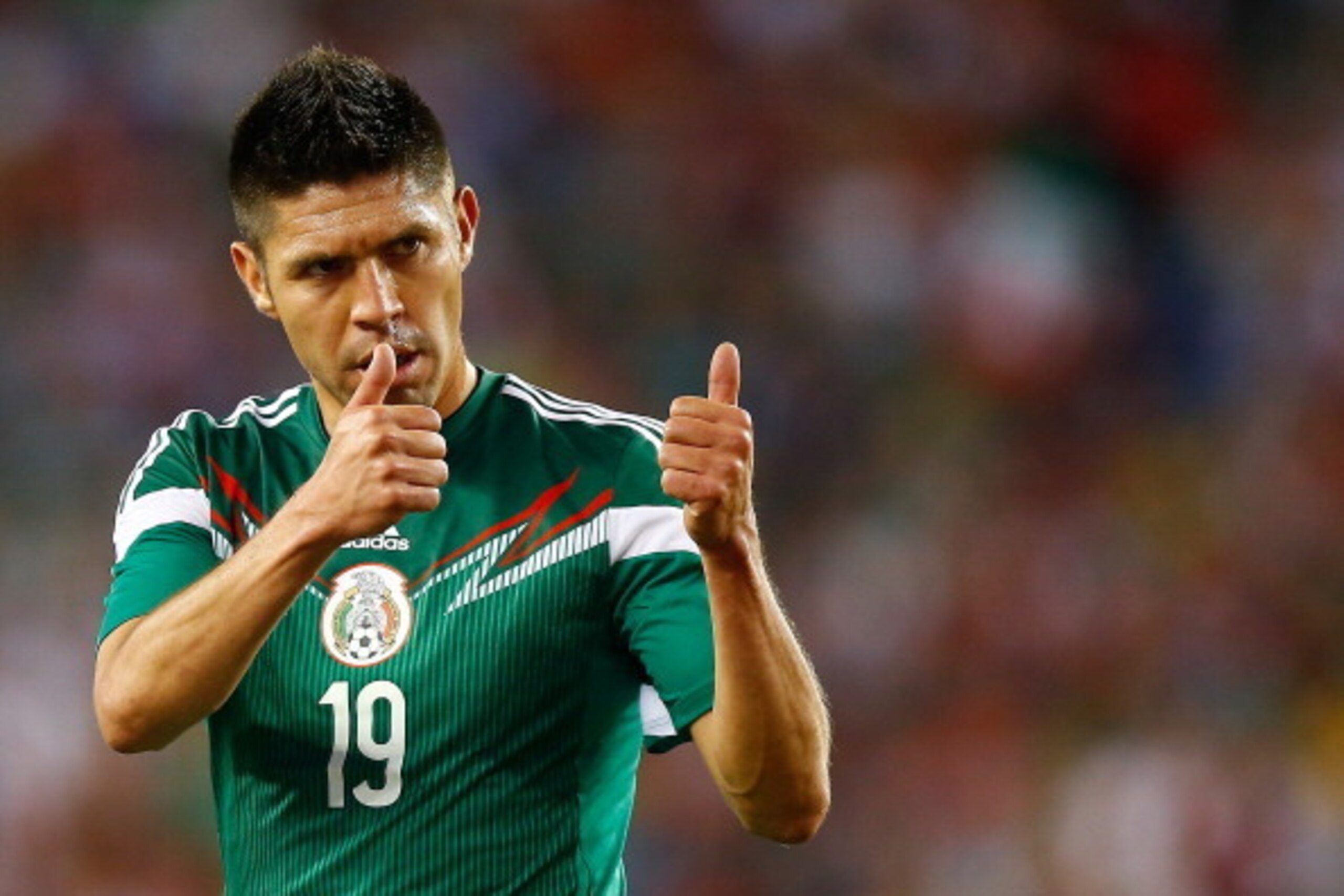 FOXBORO, MA - JUNE 06: Oribe Peralta #19 of Mexico reacts to a teammate during a corner kick against Portugal in the second half during the international friendly match at Gillette Stadium on June 6, 2014 in Foxboro, Massachusetts. (Photo by Jared Wicker FOXBORO, MA - JUNE 06: Oribe Peralta #19 of Mexico reacts to a teammate during a corner kick against Portugal in the second half during the international friendly match at Gillette Stadium on June 6, 2014 in Foxboro, Massachusetts. (Photo by Jared Wicker