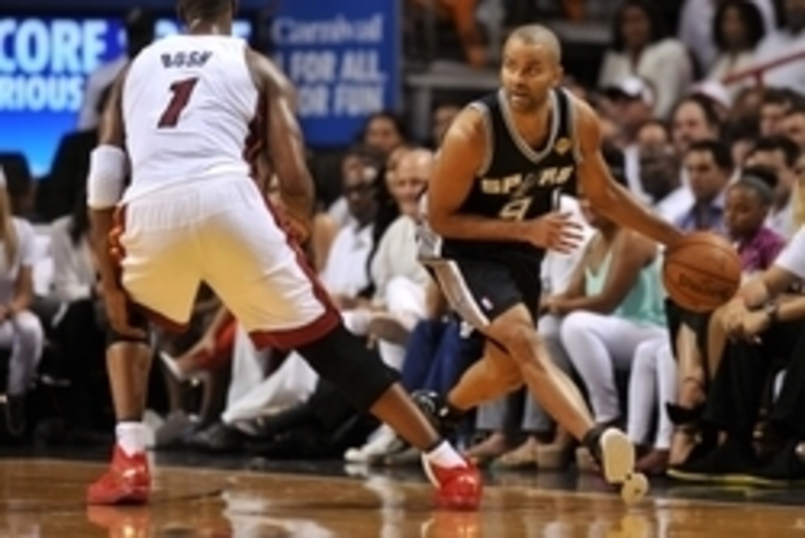 Jun 10, 2014; Miami, FL, USA; San Antonio Spurs guard Tony Parker (9) drives against Miami Heat center Chris Bosh (1) during the second quarter of game three of the 2014 NBA Finals at American Airlines Arena. Mandatory Credit: Steve Mitchell-USA TODAY Spo Jun 10, 2014; Miami, FL, USA; San Antonio Spurs guard Tony Parker (9) drives against Miami Heat center Chris Bosh (1) during the second quarter of game three of the 2014 NBA Finals at American Airlines Arena. Mandatory Credit: Steve Mitchell-USA TODAY Spo