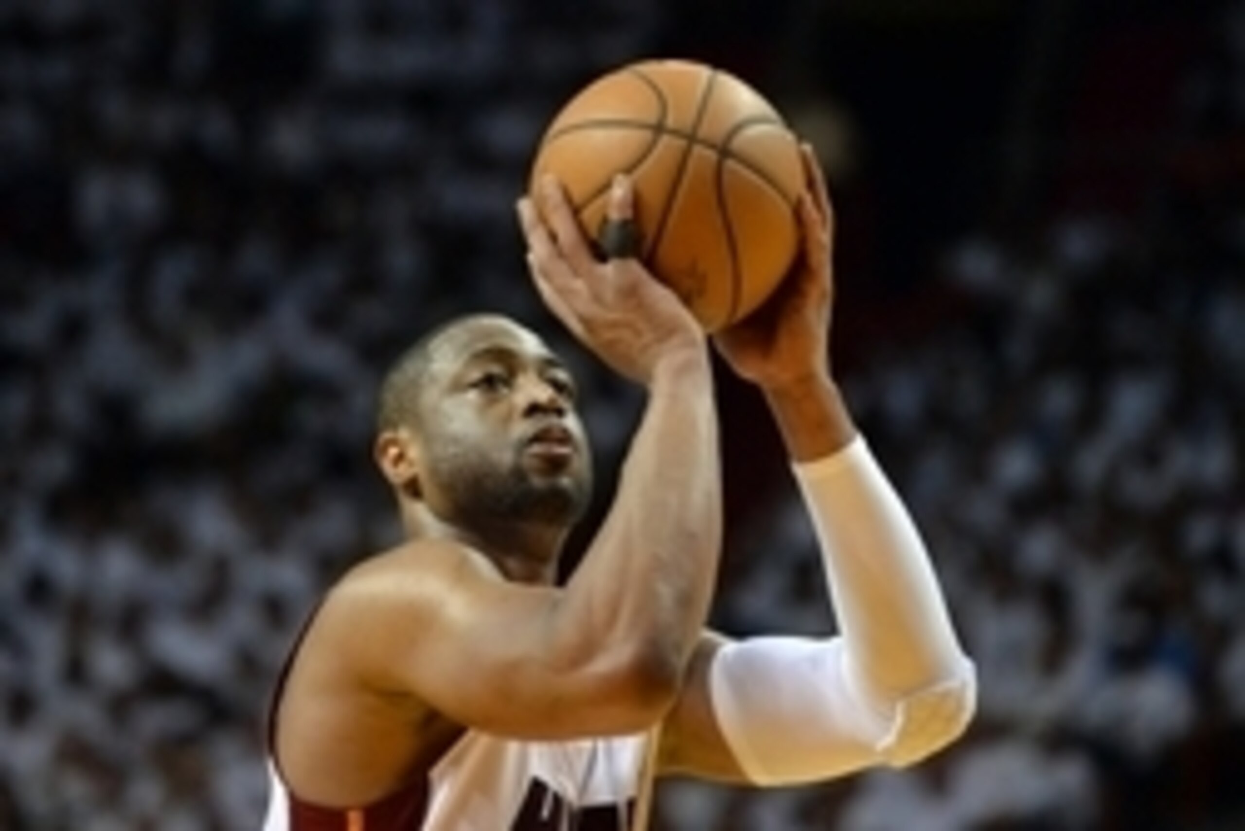 Jun 10, 2014; Miami, FL, USA; Miami Heat guard Dwyane Wade (3) shoots a free throw against the San Antonio Spurs during the second quarter of game three of the 2014 NBA Finals at American Airlines Arena. Mandatory Credit: Steve Mitchell-USA TODAY Sports Jun 10, 2014; Miami, FL, USA; Miami Heat guard Dwyane Wade (3) shoots a free throw against the San Antonio Spurs during the second quarter of game three of the 2014 NBA Finals at American Airlines Arena. Mandatory Credit: Steve Mitchell-USA TODAY Sports