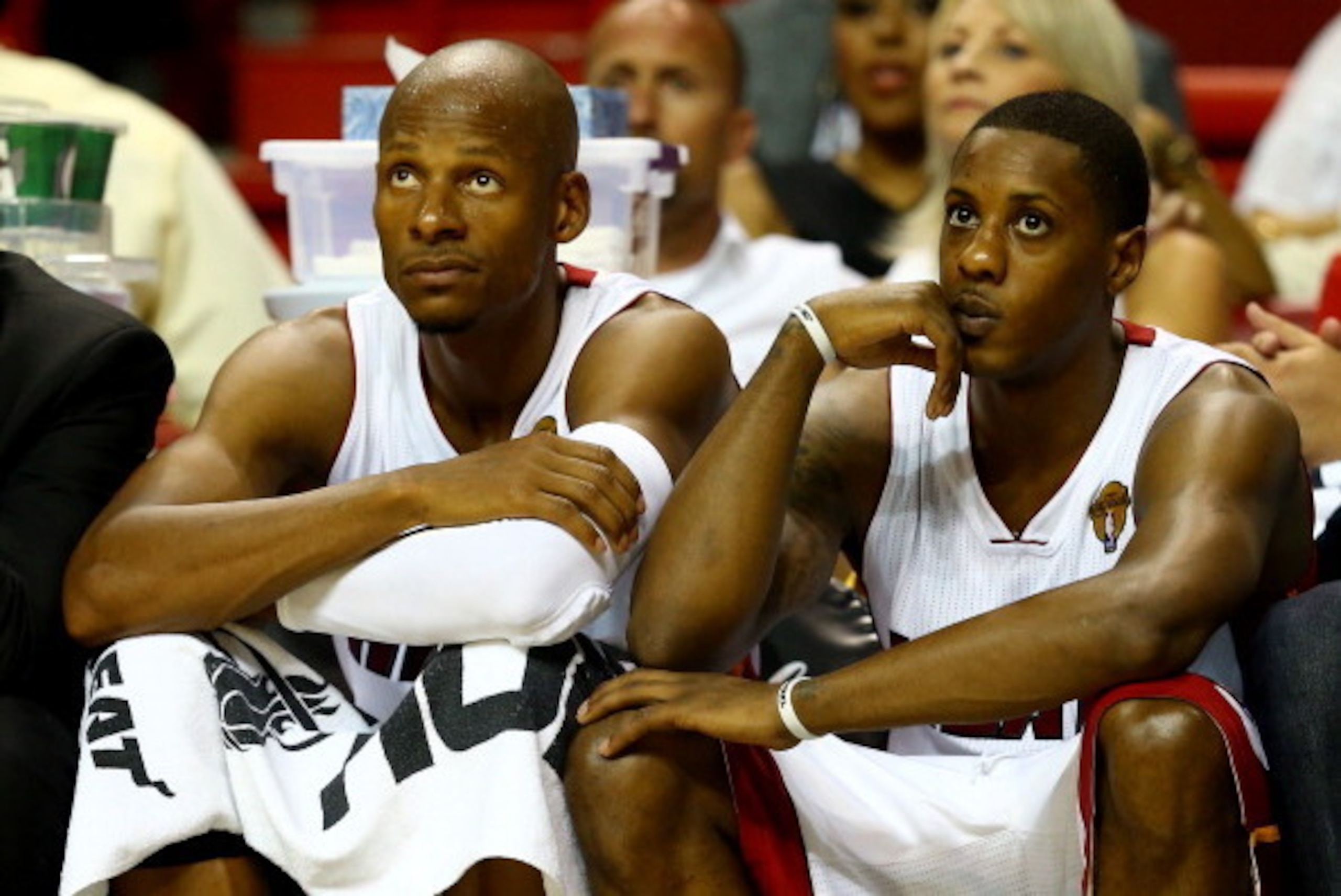 MIAMI, FL - JUNE 10: Ray Allen #34 and Mario Chalmers #15 of the Miami Heat look on from the bench against the San Antonio Spurs during Game Three of the 2014 NBA Finals at American Airlines Arena on June 10, 2014 in Miami, Florida. NOTE TO USER: User ex MIAMI, FL - JUNE 10: Ray Allen #34 and Mario Chalmers #15 of the Miami Heat look on from the bench against the San Antonio Spurs during Game Three of the 2014 NBA Finals at American Airlines Arena on June 10, 2014 in Miami, Florida. NOTE TO USER: User ex