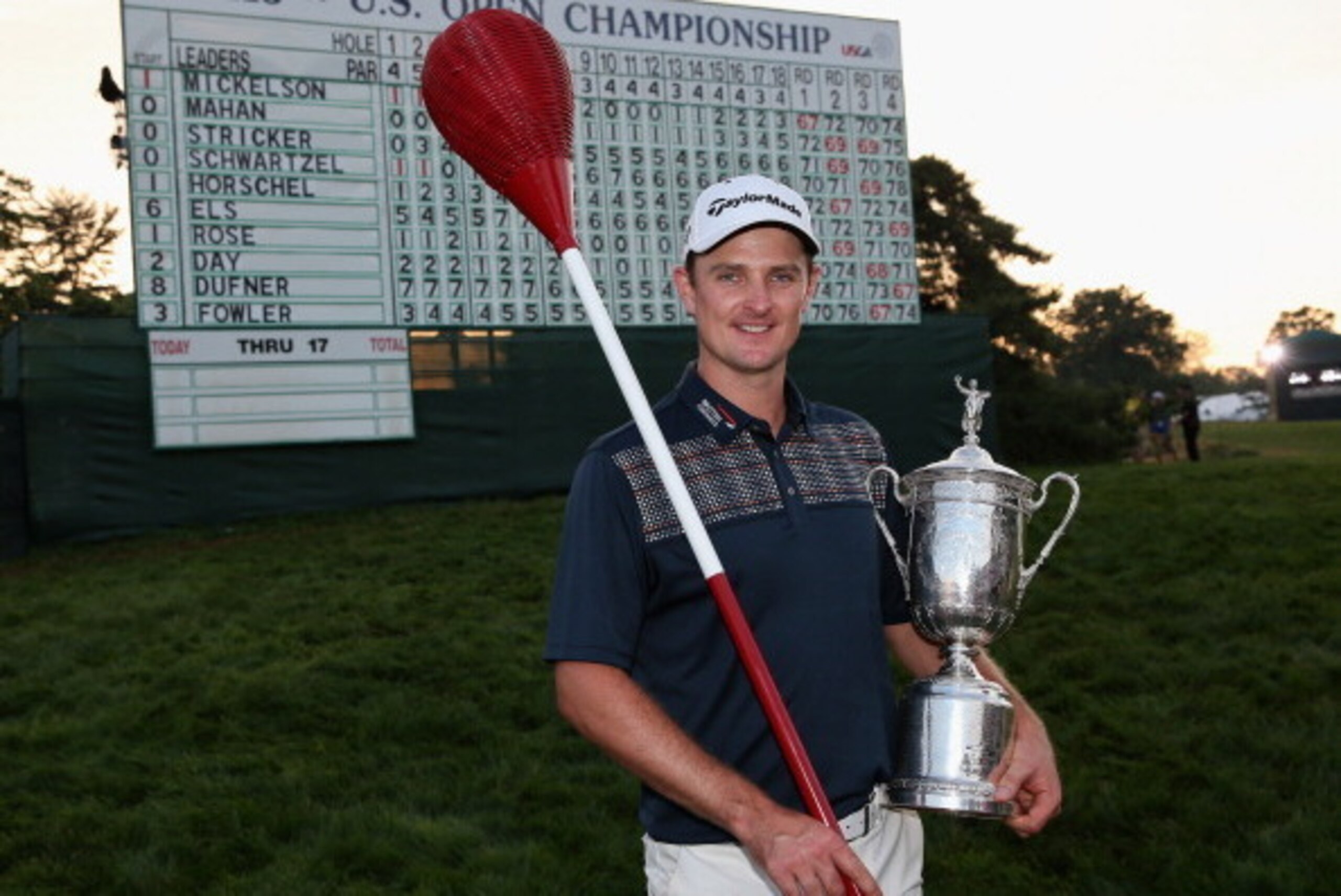 ARDMORE, PA - JUNE 16:  Justin Rose of England celebrates with the U.S. Open trophy while holding a wicker basket flagstick after winning the 113th U.S. Open at Merion Golf Club on June 16, 2013 in Ardmore, Pennsylvania.  (Photo by Andrew Redington/Getty 