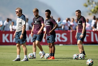 RIO DE JANEIRO, BRAZIL - JUNE 09:  (L-R) Roy Hodgson, Manager of England, Luke Shaw of England, Raheem Sterling of England and James Milner of England during a training session at the Urca military base (Forte de Urca) training ground on June 9, 2014 in R