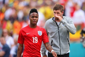 MIAMI GARDENS, FL - JUNE 04:  Steven Gerrard of England speaks with Raheem Sterling of England after he was shown a red card  during the International friendly match between England and Ecuador at Sun Life Stadium on June 4, 2014 in Miami Gardens, Florida