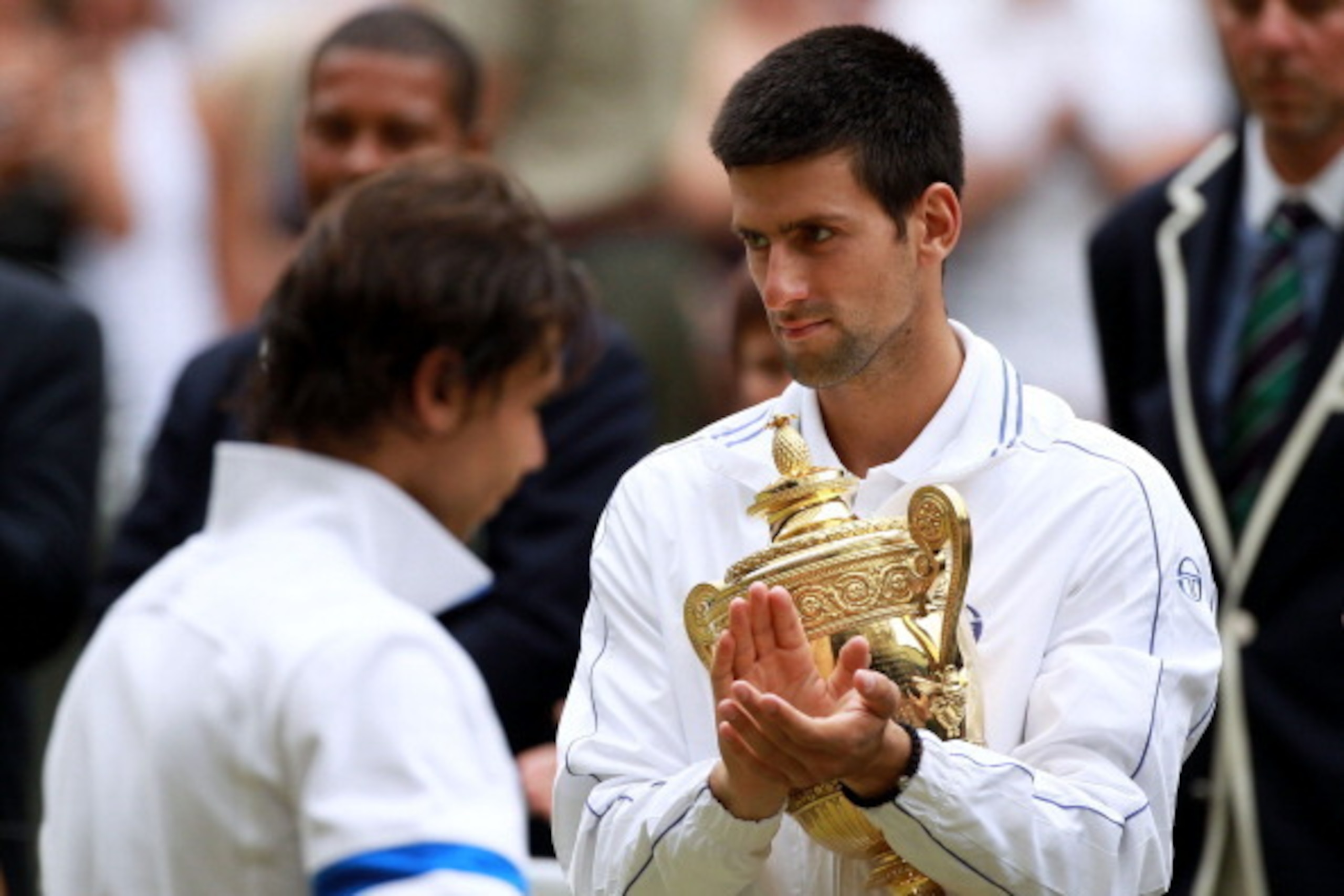 LONDON, ENGLAND - JULY 03:  Novak Djokovic of Serbia holds the championship trophy after winning his final round Gentlemen's match against Rafael Nadal of Spain on Day Thirteen of the Wimbledon Lawn Tennis Championships at the All England Lawn Tennis and 