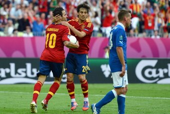 GDANSK, POLAND - JUNE 10:  Cesc Fabregas of Spain celebrates scoring their first goal with David Silva during the UEFA EURO 2012 group C match between Spain and Italy at The Municipal Stadium on June 10, 2012 in Gdansk, Poland.  (Photo by Jasper Juinen/Ge