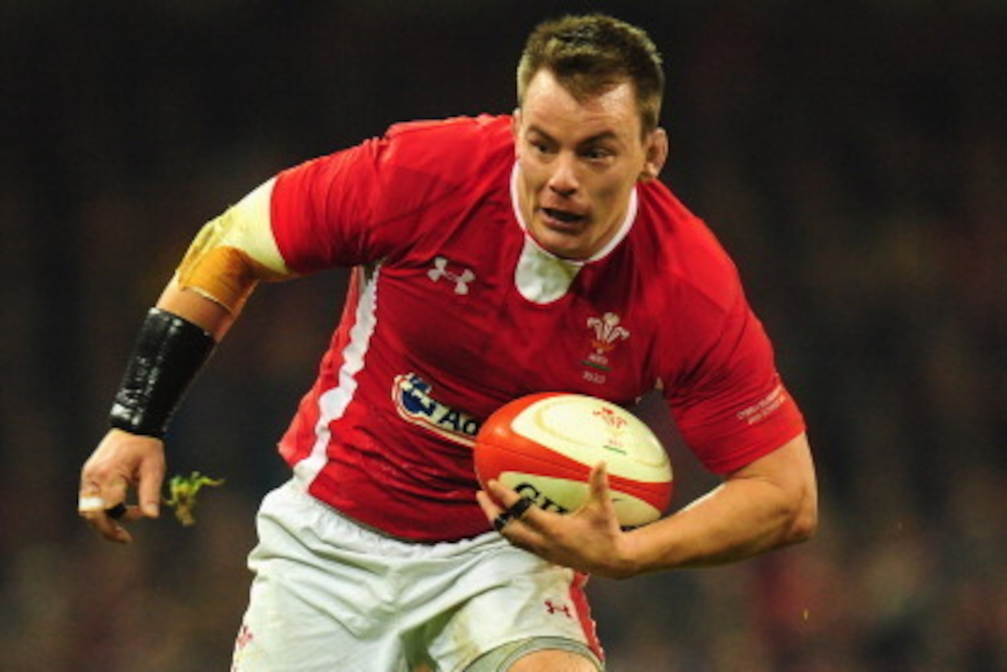 CARDIFF, WALES - NOVEMBER 24:  Wales forward Matthew Rees runs into the All Blacks defence during the International Match between Wales and New Zealand at Millennium Stadium on November 24, 2012 in Cardiff, Wales.  (Photo by Stu Forster/Getty Images)