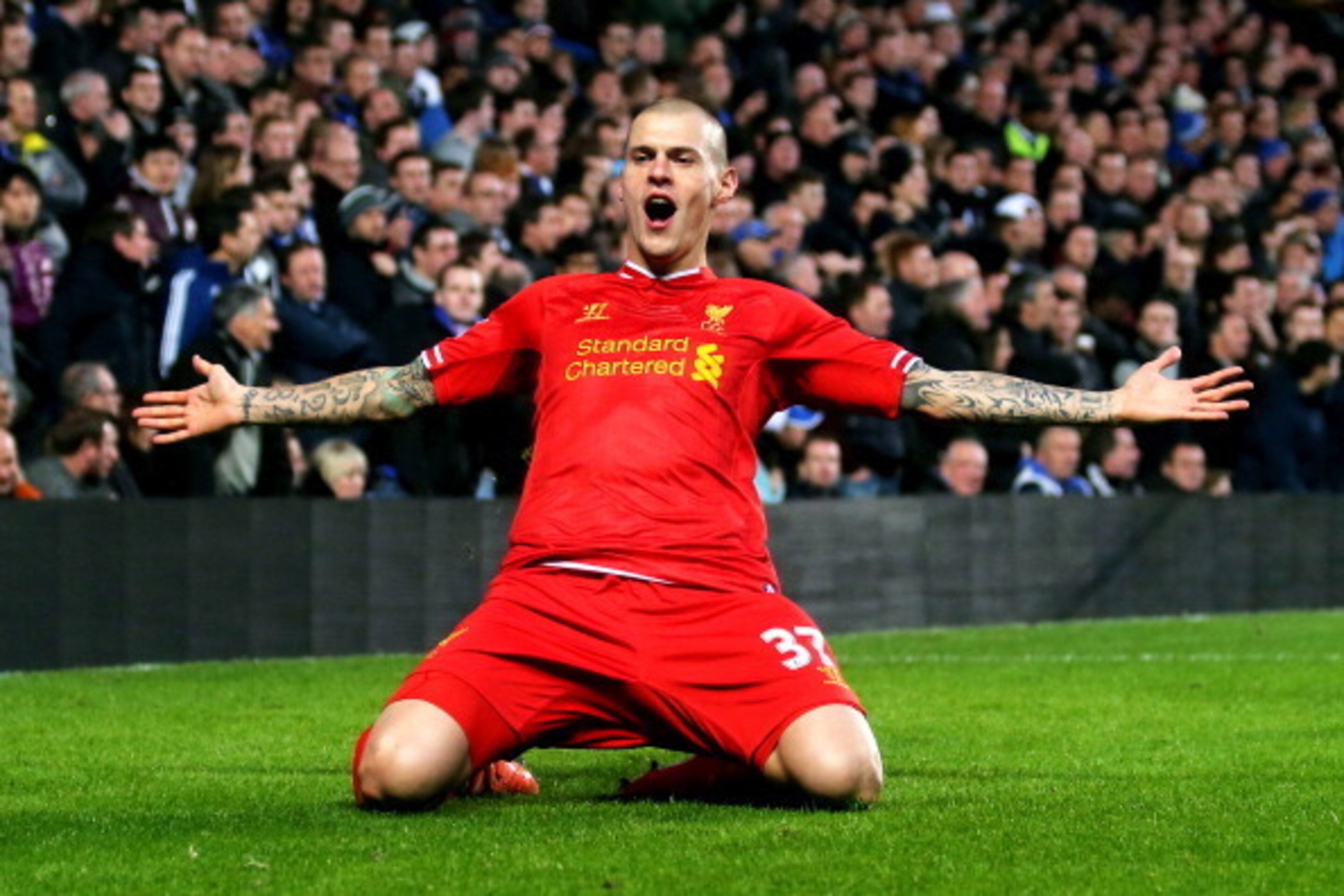 LONDON, ENGLAND - DECEMBER 29: Martin Skrtel of Liverpool celebrates after scoring the opening goal during the Barclays Premier League match between Chelsea and Liverpool at Stamford Bridge on December 29, 2013 in London, England. (Photo by Clive Rose/G LONDON, ENGLAND - DECEMBER 29: Martin Skrtel of Liverpool celebrates after scoring the opening goal during the Barclays Premier League match between Chelsea and Liverpool at Stamford Bridge on December 29, 2013 in London, England. (Photo by Clive Rose/G