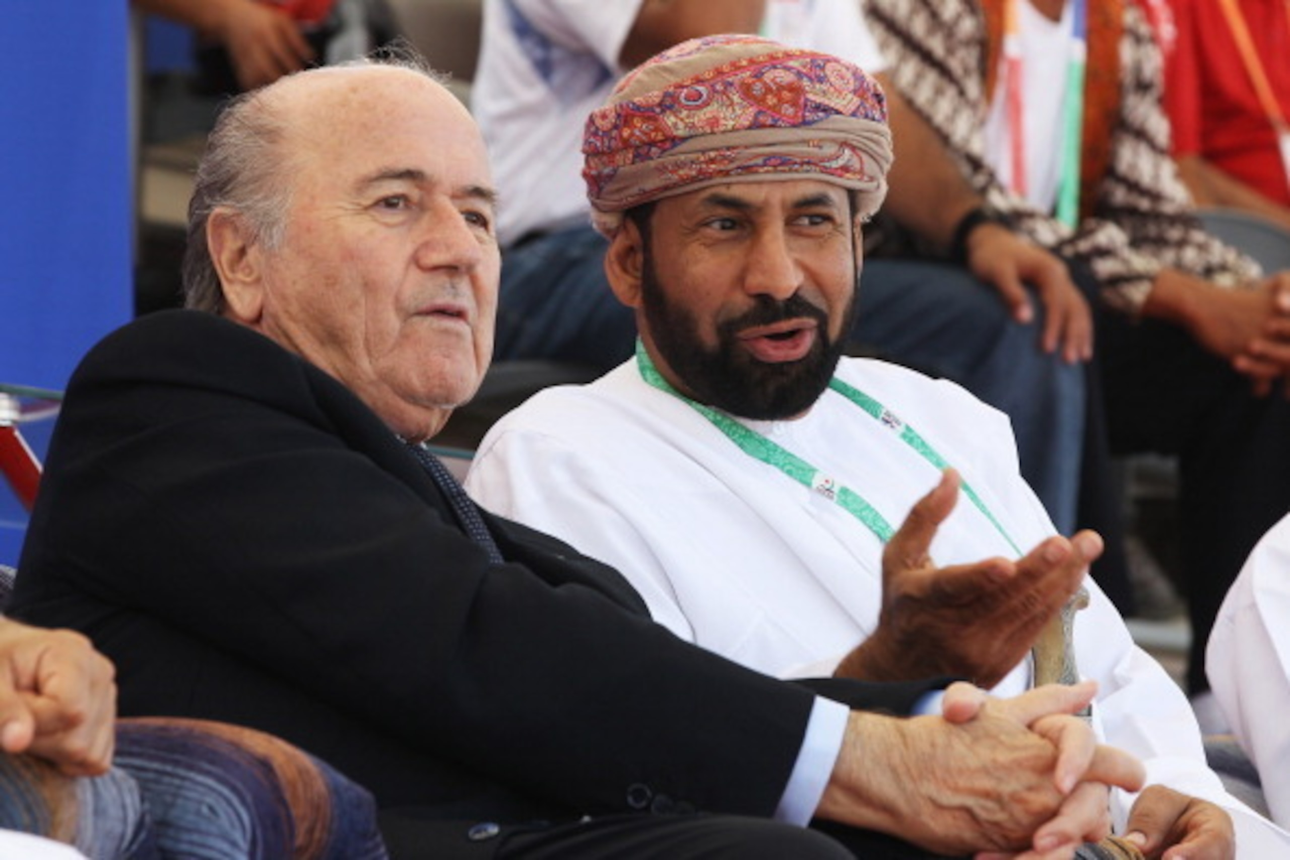MUSCAT, OMAN - DECEMBER 09:  FIFA President Joseph Sepp Blatter watches the Uzbekistan and Qatar Beach Soccer with Shaikh Rashid bin Ahmed al Hinai OCCI Board member at Al-Musannah Sports City during day two of the 2nd Asian Beach Games Muscat 2010 on Dec