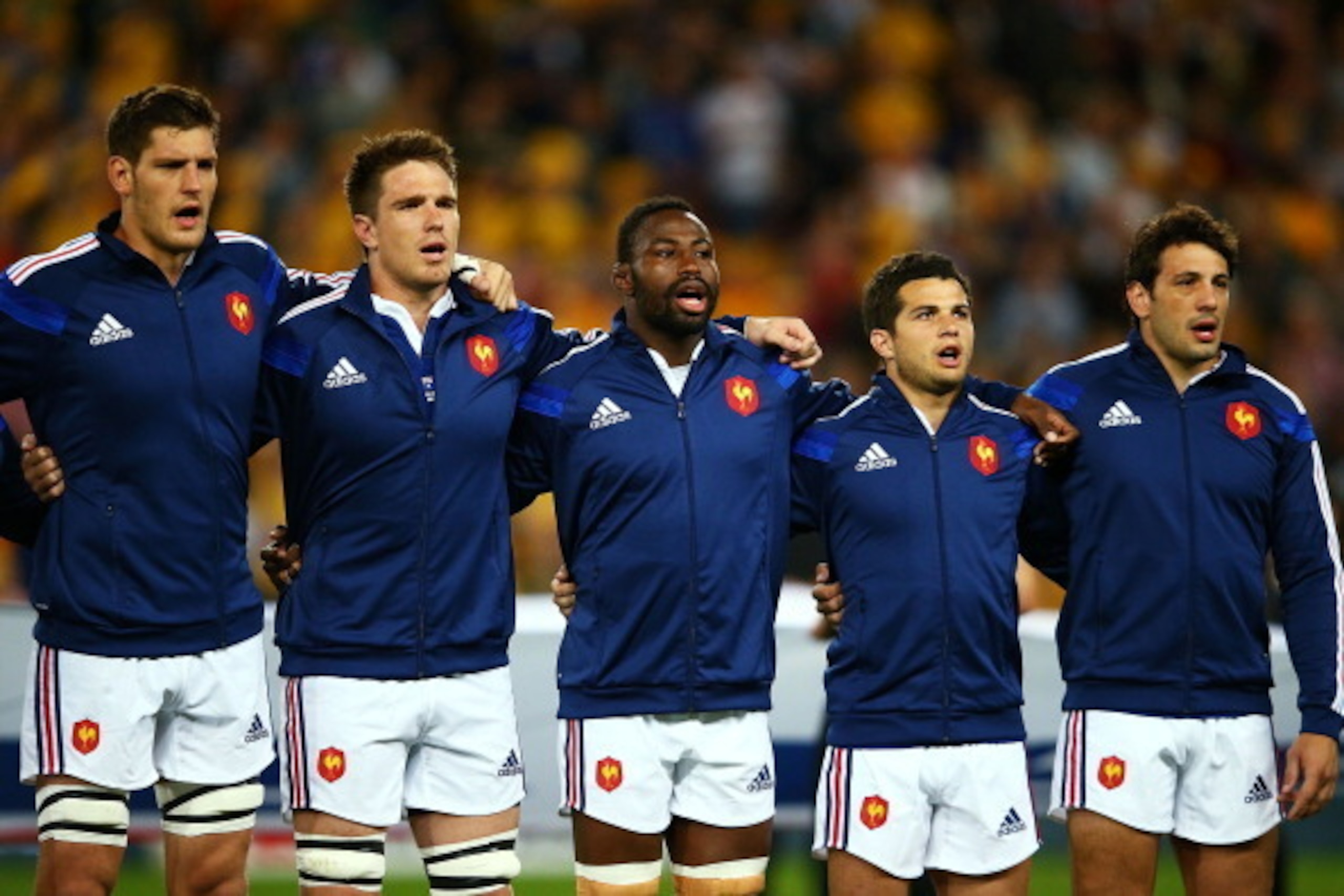 BRISBANE, AUSTRALIA - JUNE 07:  French team members sing their national anthem during the First International Test Match between the Australian Wallabies and France at Suncorp Stadium on June 7, 2014 in Brisbane, Australia.  (Photo by Mark Nolan/Getty Ima