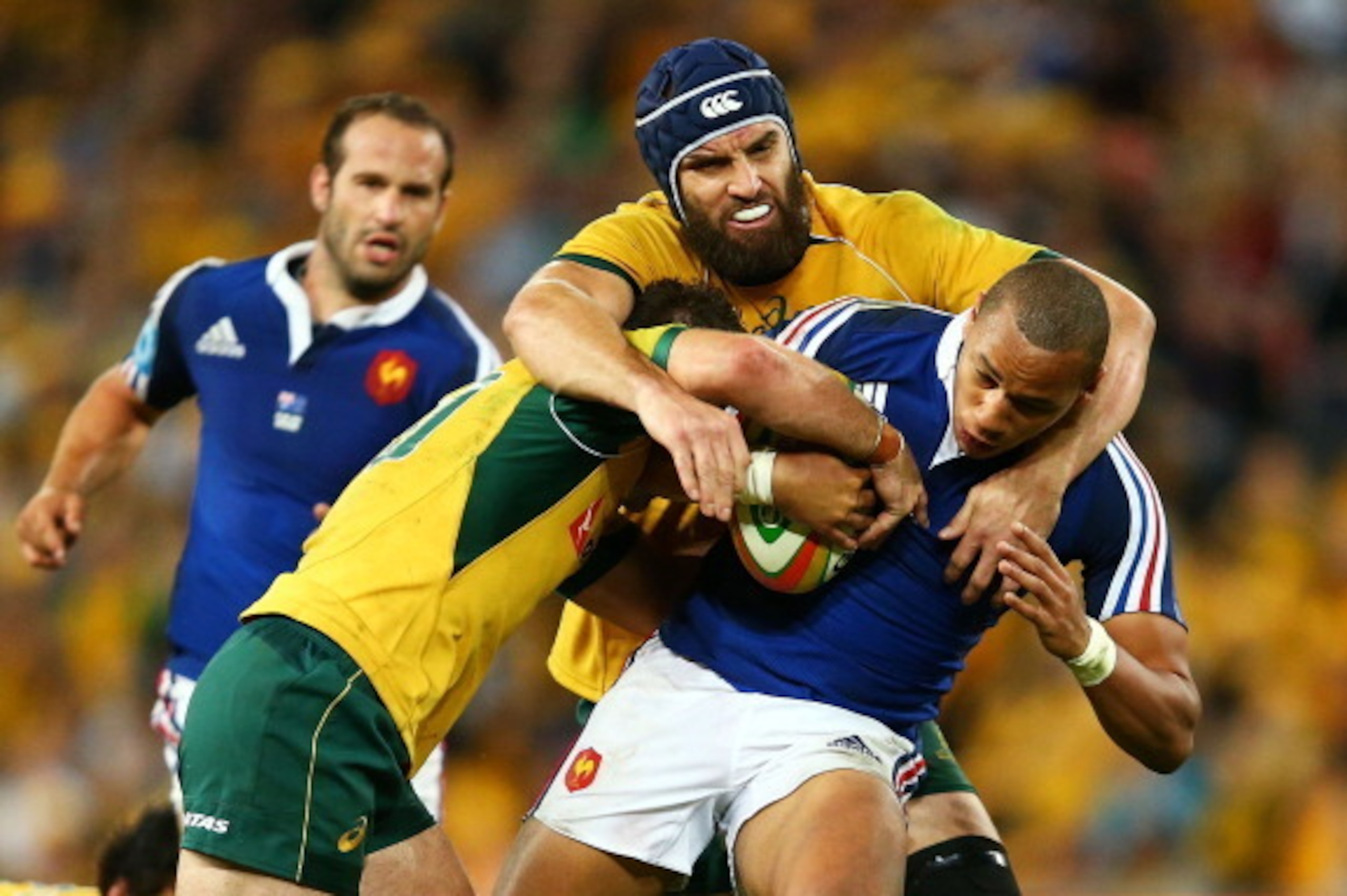 BRISBANE, AUSTRALIA - JUNE 07:  Scott Fardy of the Wallabies tackles Gael Fickou of France during the First International Test Match between the Australian Wallabies and France at Suncorp Stadium on June 7, 2014 in Brisbane, Australia.  (Photo by Mark Nol