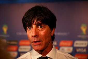 COSTA DO SAUIPE, BRAZIL - DECEMBER 06:  Germany coach Joachim Loew speaks to members of the media after the Final Draw for the 2014 FIFA World Cup Brazil at Costa do Sauipe Resort on December 6, 2013 in Costa do Sauipe, Bahia, Brazil.  (Photo by Clive Mas