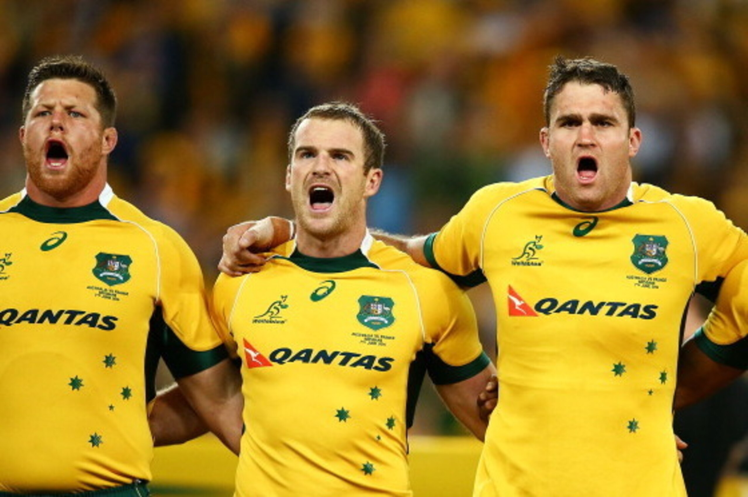 BRISBANE, AUSTRALIA - JUNE 07: Wallabies Paddy Ryan, Pat McCabe and James Horwill sing the national anthem before the First International Test Match between the Australian Wallabies and France at Suncorp Stadium on June 7, 2014 in Brisbane, Australia.  (P