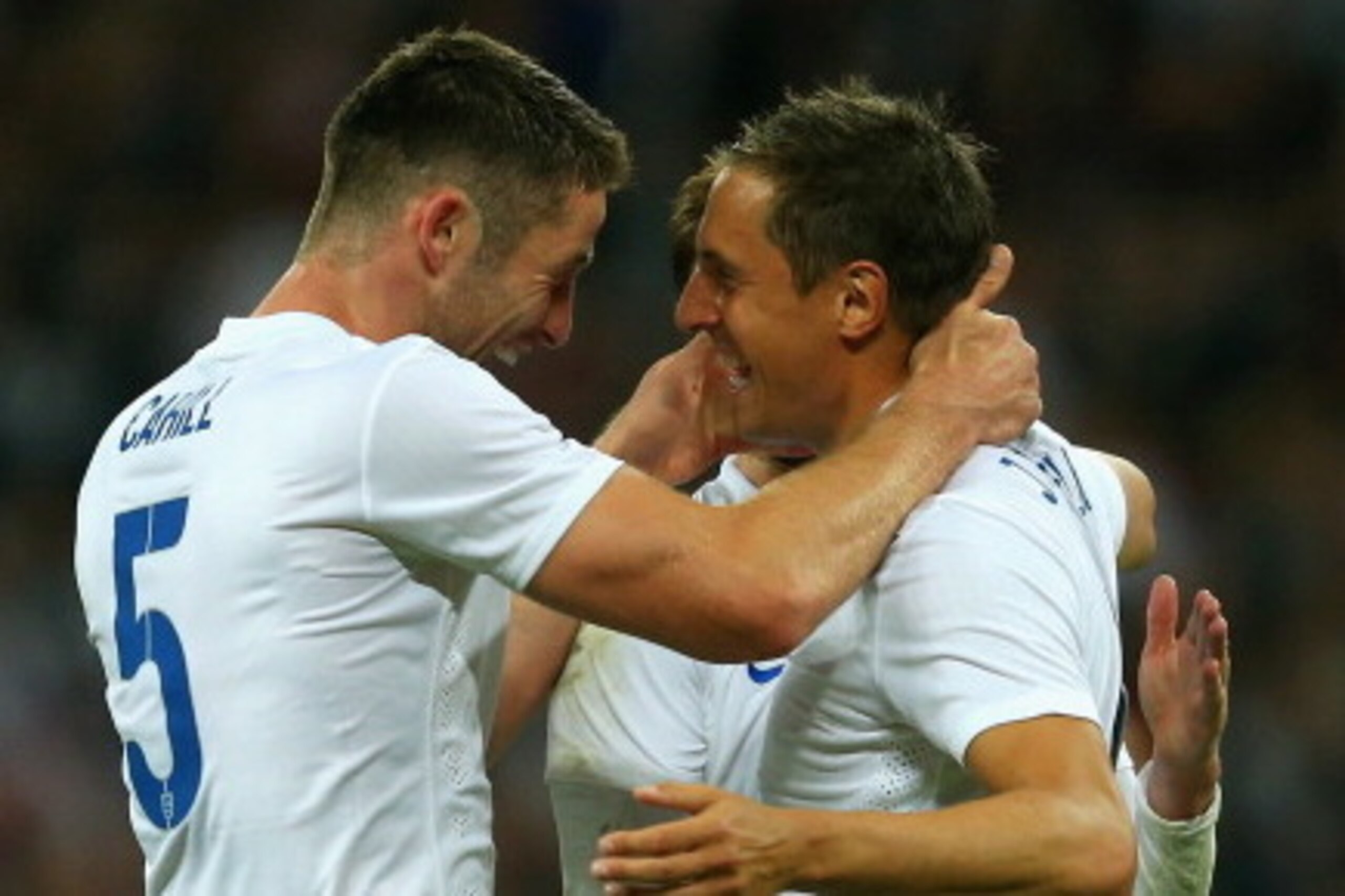 LONDON, ENGLAND - MAY 30:  Gary Cahill of England congratulates Phil Jagielka of England on scoring their third goal during the international friendly match between England and Peru at Wembley Stadium on May 30, 2014 in London, England.  (Photo by Warren 