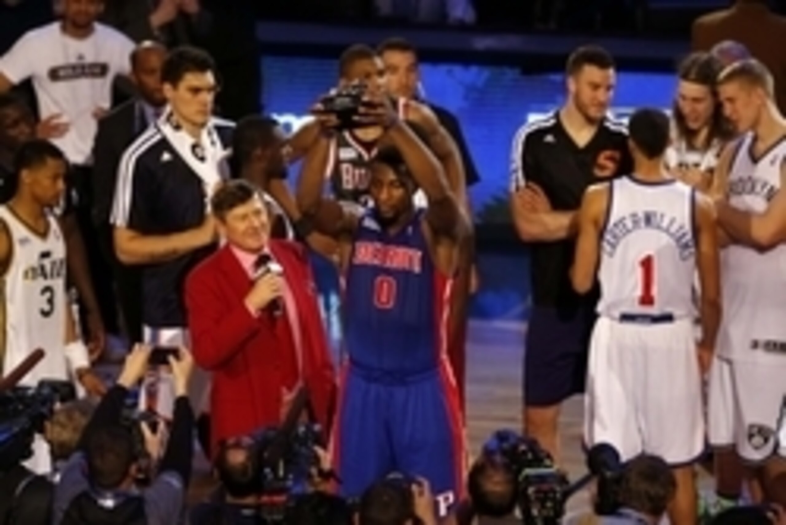 Feb 14, 2014; New Orleans, LA, USA; Team Hill center Andre Drummond (0) holds up the MVP Trophy after Rising Stars Challenge at Smoothie King Center. Mandatory Credit: Derick E. Hingle-USA TODAY Sports