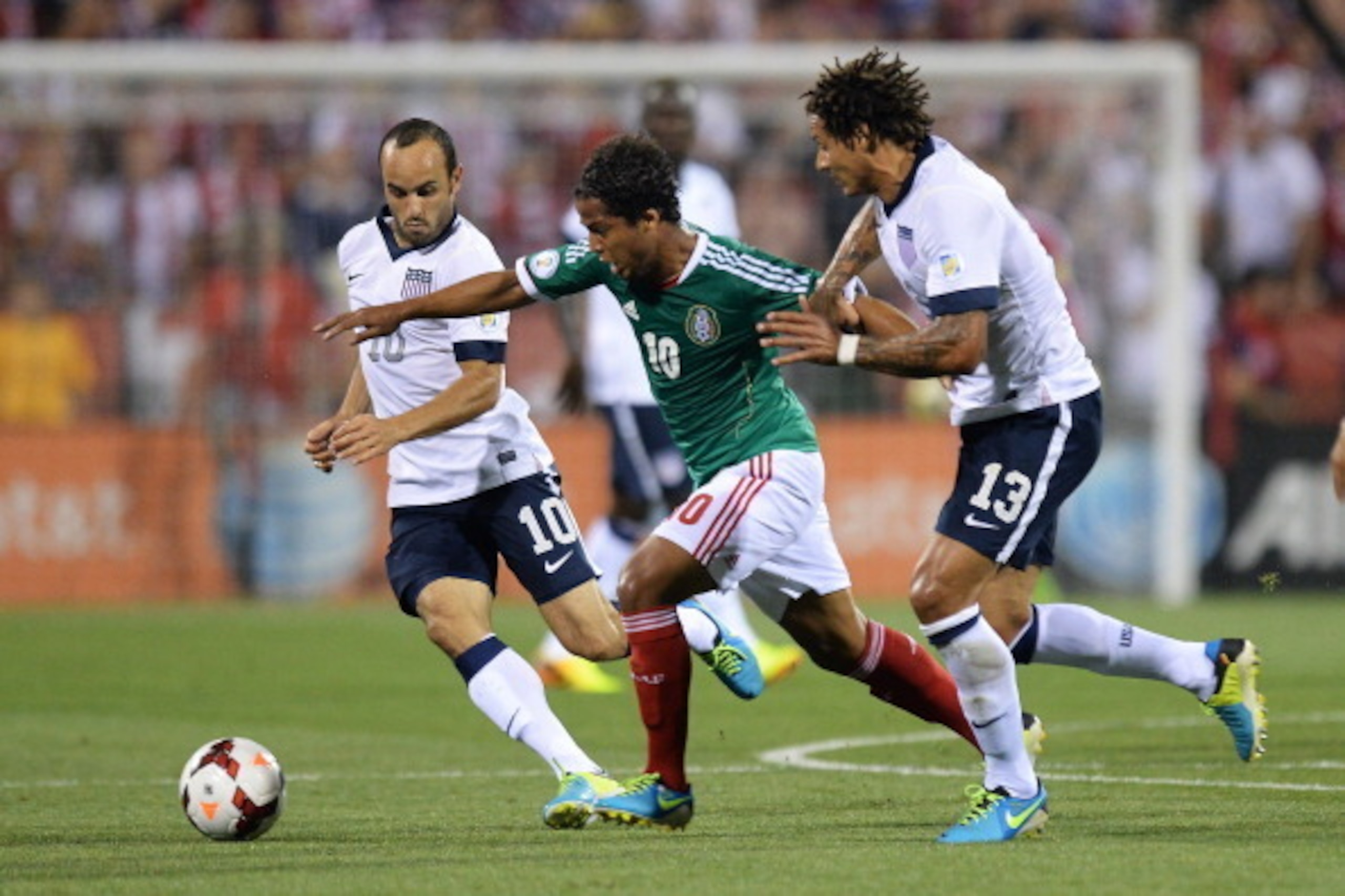 COLUMBUS, OH - SEPTEMBER 10:  Landon Donovan #10 of the United States Men's National Team and Jermaine Jones #13 of the United States MenÕs National Team defend against Giovani dos Santos #10 of the Mexico Men's National Team in the first half at Columbus