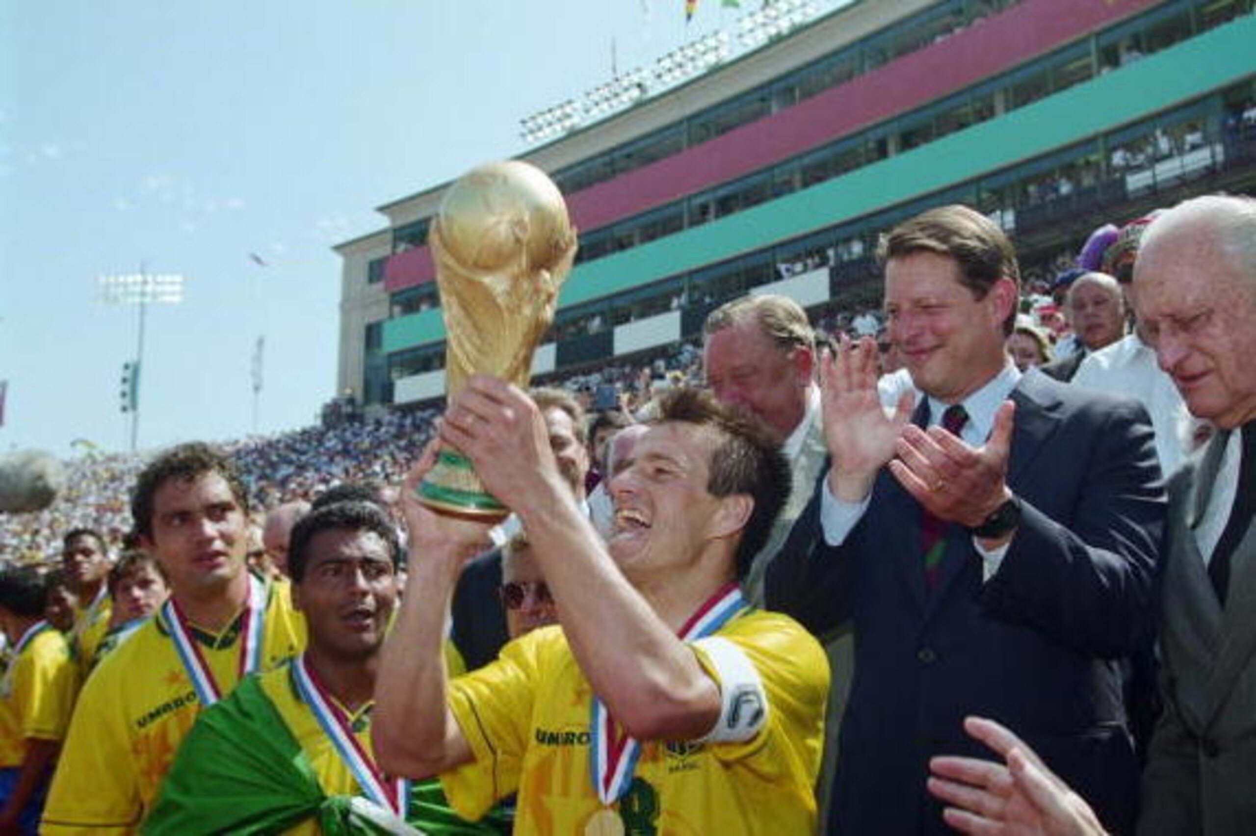 17 JUL 1994 :  BRAZILIAN CAPTAIN DUNGA RECEIVES THE WORLD CUP TROPHY FROM VICE PRESIDENT AL GORE AFTER DEFEATING ITALY IN THE 1994 WORLD CUP FINAL AT THE ROSE BOWL STADIUM IN PASADENA, CALIFORNIA.  BRAZIL WON THE WORLD CUP ON A PENALTY SHOOT-OUT. Mandator