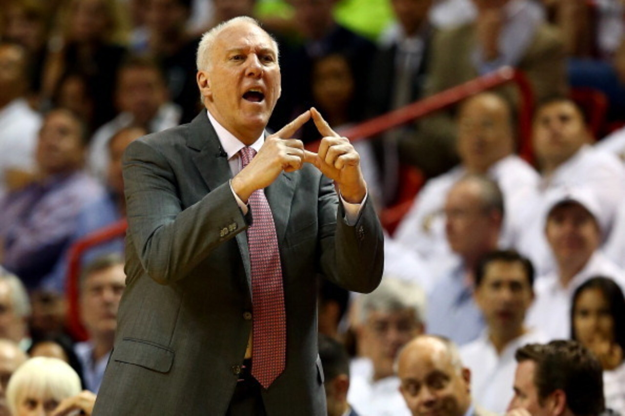 MIAMI, FL - JUNE 10:  Gregg Popovich of the San Antonio Spurs motions to his players against the Miami Heat during Game Three of the 2014 NBA Finals at American Airlines Arena on June 10, 2014 in Miami, Florida. NOTE TO USER: User expressly acknowledges a