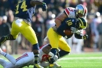 Nov 30, 2013; Ann Arbor, MI, USA; Michigan Wolverines defensive back Blake Countess (18) intercepts a pass during the second quarter against the Ohio State Buckeyes at Michigan Stadium. Mandatory Credit: Andrew Weber-USA TODAY Sports
