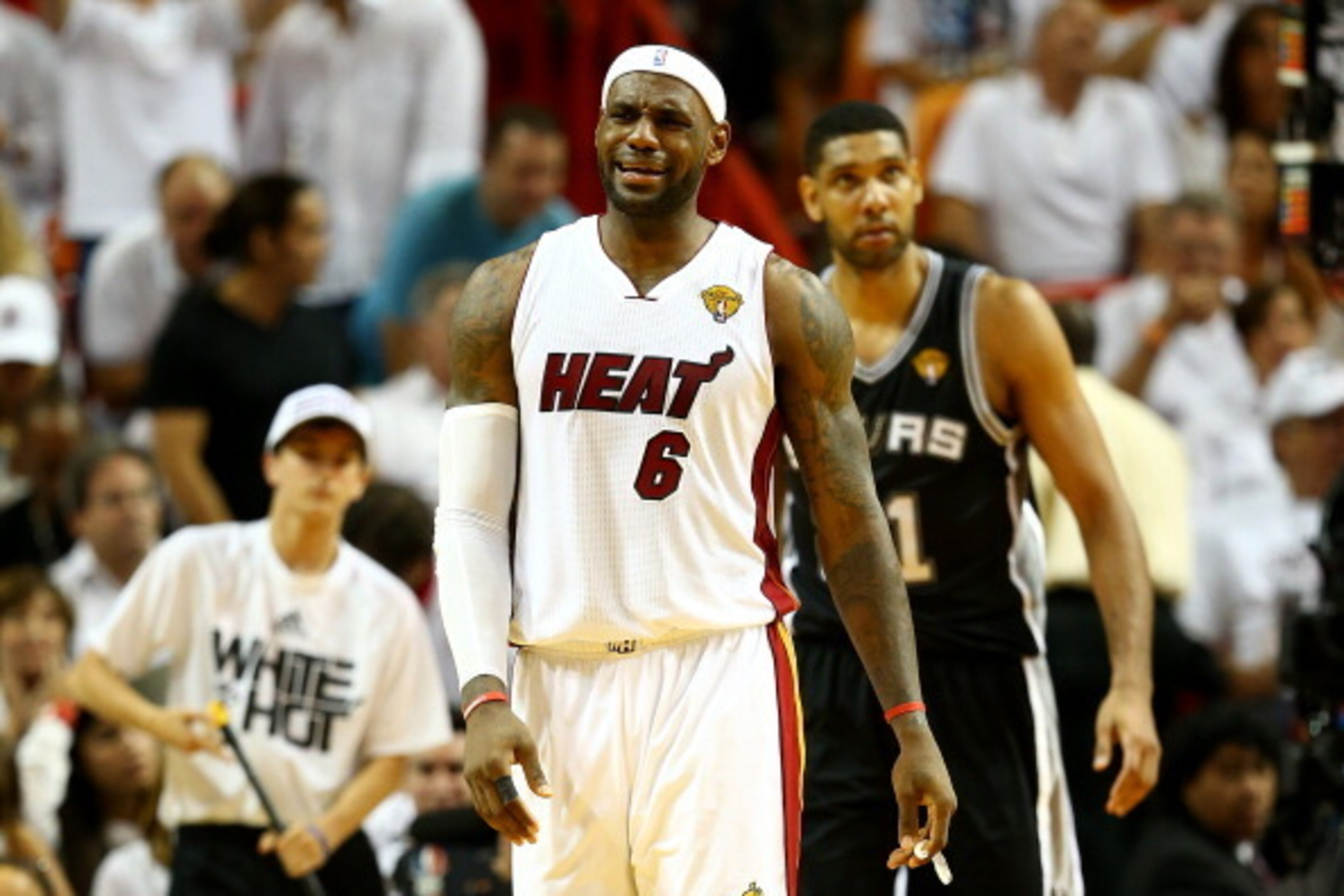 MIAMI, FL - JUNE 10:  LeBron James #6 of the Miami Heat reacts against the San Antonio Spurs during Game Three of the 2014 NBA Finals at American Airlines Arena on June 10, 2014 in Miami, Florida. NOTE TO USER: User expressly acknowledges and agrees that,