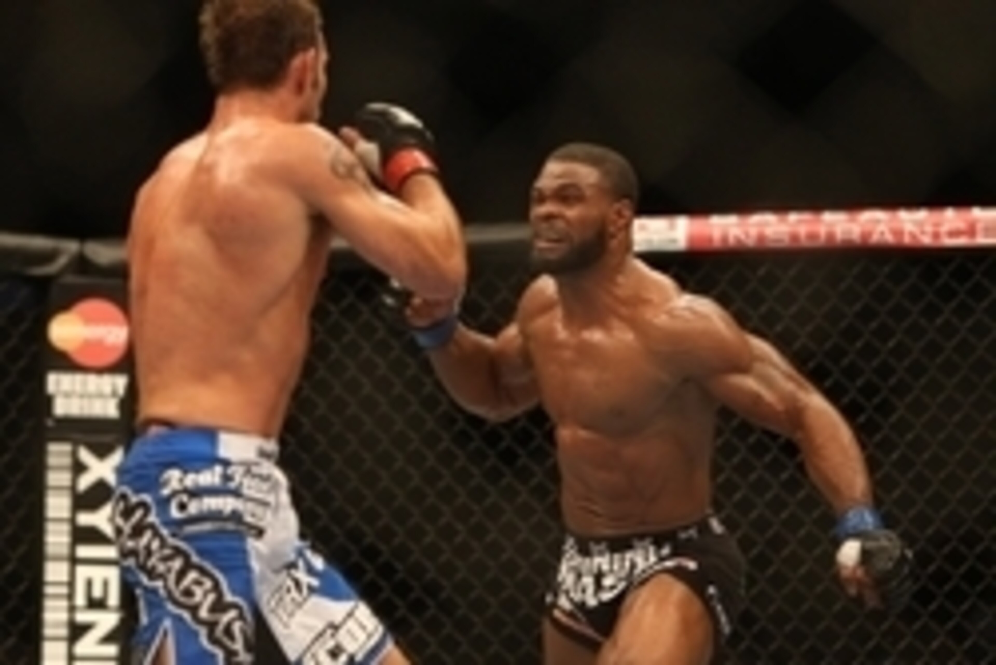 Jun 15, 2013; Winnipeg, MB, Canada; Jake Shields (left) fights Tyron Woodley during their Welterweight bout at UFC 161 at MTS Centre. Mandatory Credit: Tom Szczerbowski-USA TODAY Sports Jun 15, 2013; Winnipeg, MB, Canada; Jake Shields (left) fights Tyron Woodley during their Welterweight bout at UFC 161 at MTS Centre. Mandatory Credit: Tom Szczerbowski-USA TODAY Sports