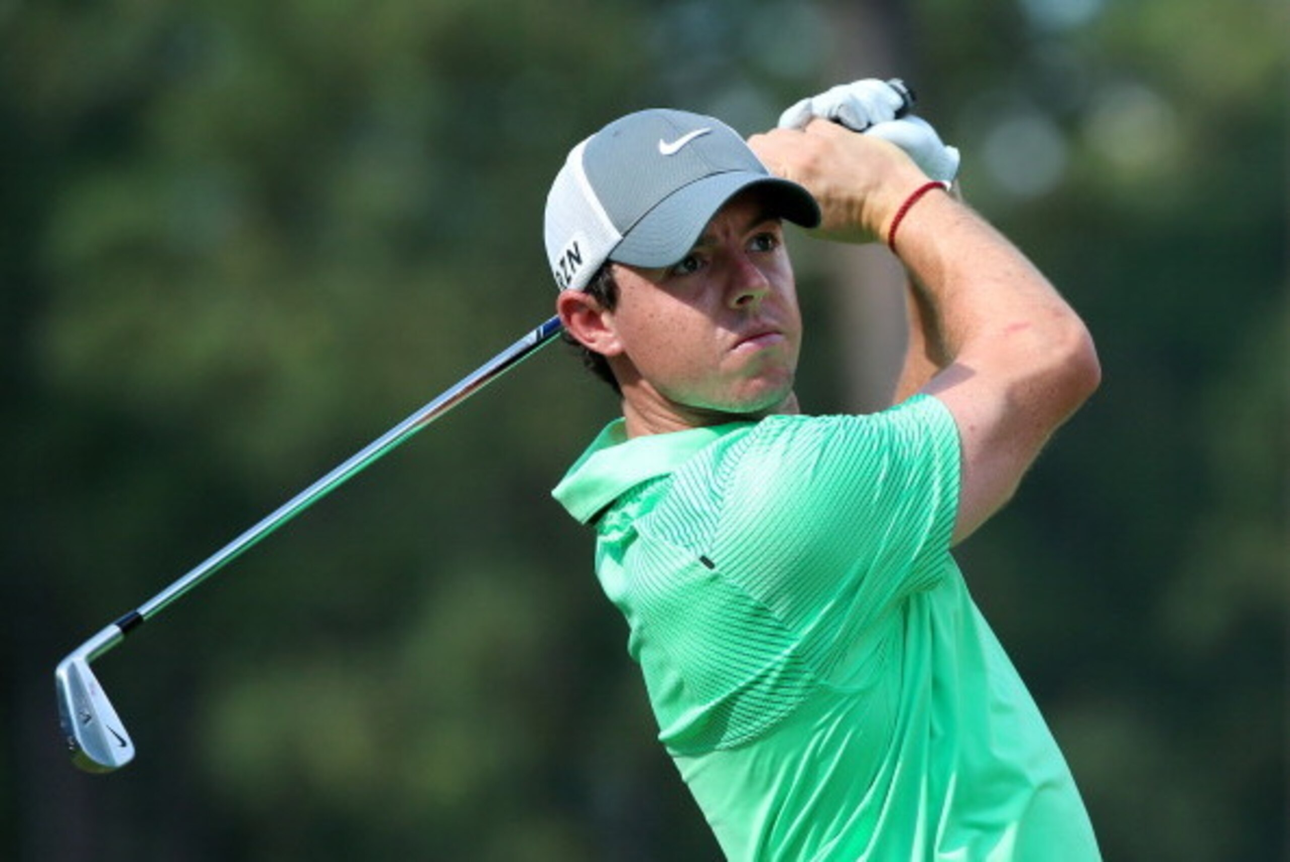 PINEHURST, NC - JUNE 10:  Rory McIlroy of Northern Ireland hits a shot during a practice round prior to the start of the 114th U.S. Open at Pinehurst Resort & Country Club, Course No. 2 on June 10, 2014 in Pinehurst, North Carolina.  (Photo by Andrew Redi