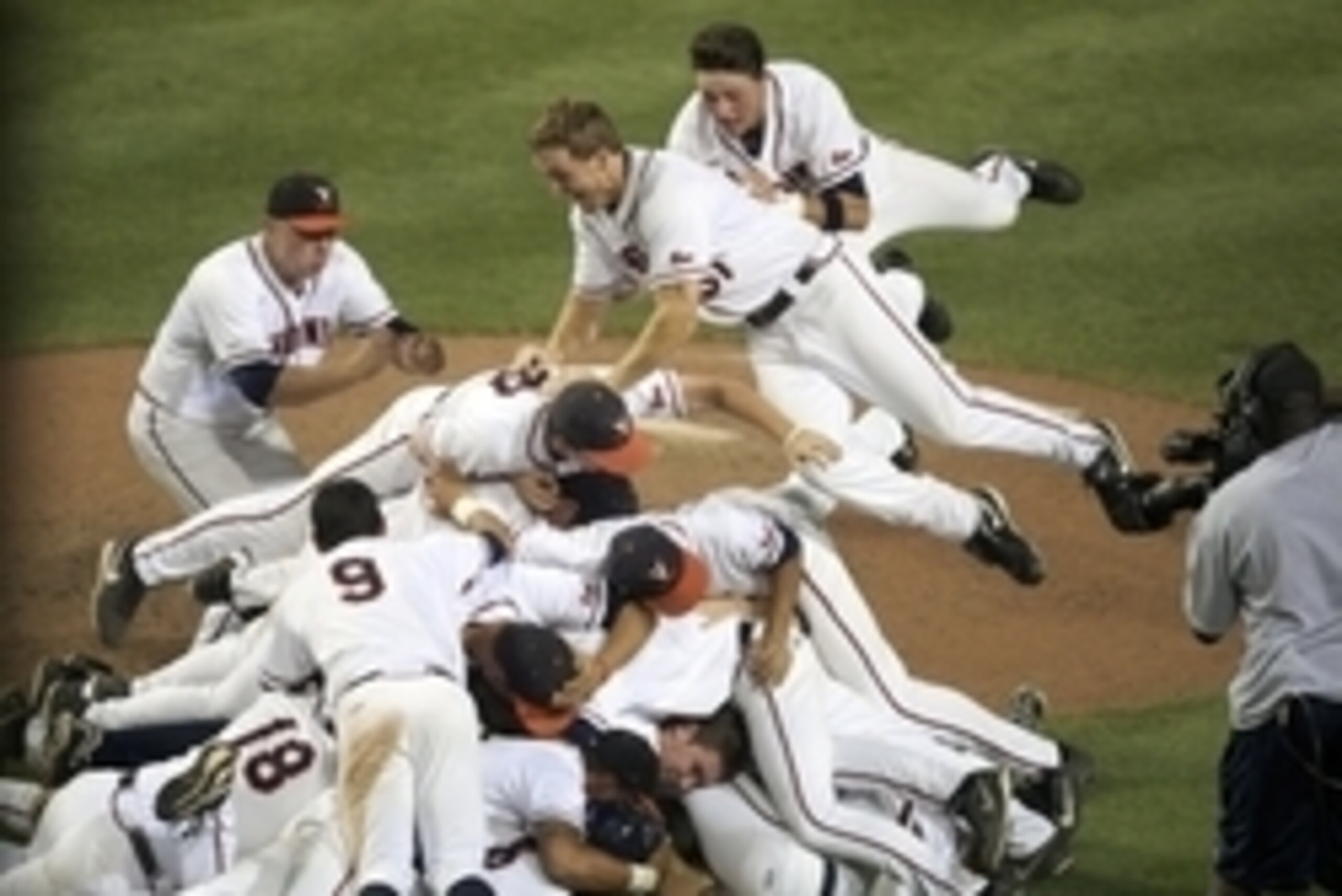 Jun 9, 2014; Charlottesville, VA, USA; The Virginia Cavaliers celebrate after defeating the Maryland Terrapins to reach the College World Series at Davenport Field. Mandatory Credit: Rafael Suanes-USA TODAY Sports Jun 9, 2014; Charlottesville, VA, USA; The Virginia Cavaliers celebrate after defeating the Maryland Terrapins to reach the College World Series at Davenport Field. Mandatory Credit: Rafael Suanes-USA TODAY Sports
