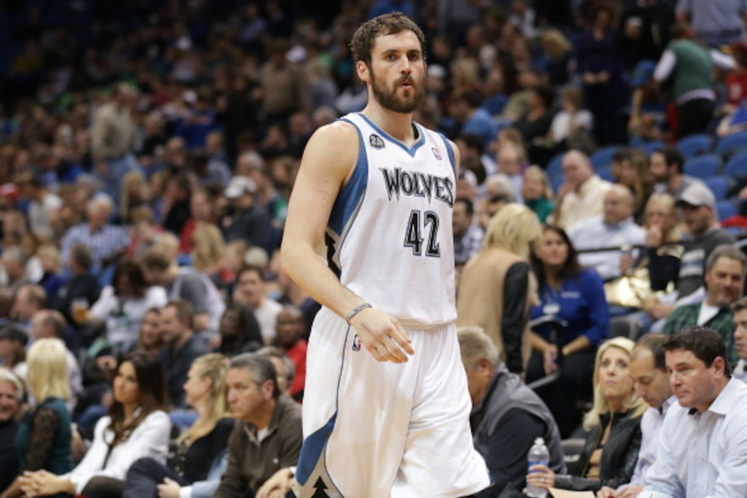 MINNEAPOLIS, MN - NOVEMBER 16:  Kevin Love #42 of the Minnesota Timberwolves stands on the court against the Boston Celtics on November 16, 2013 at Target Center in Minneapolis, Minnesota. NOTE TO USER: User expressly acknowledges and agrees that, by down
