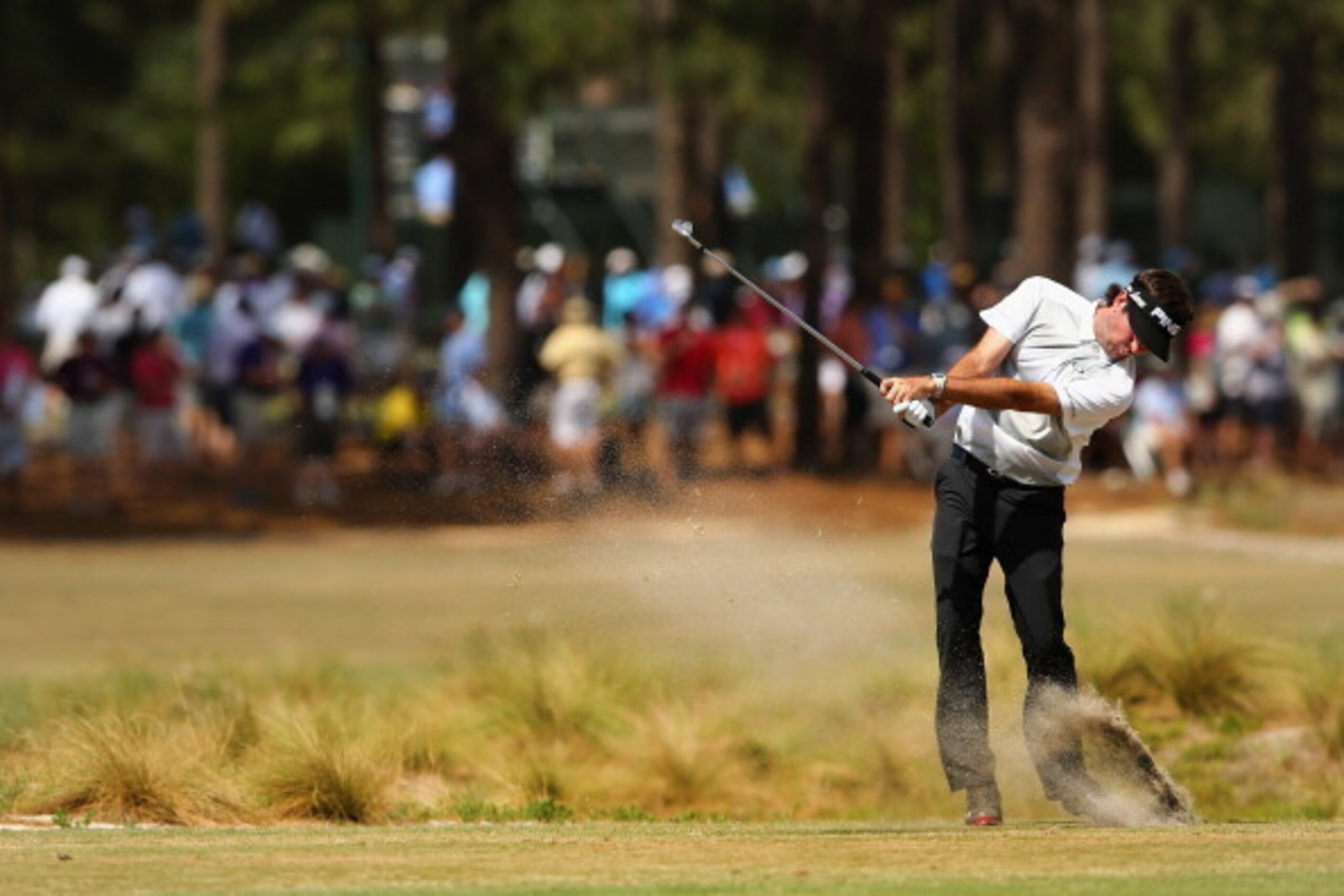PINEHURST, NC - JUNE 11:  Bubba Watson of the United States hits an approach shot during a practice round prior to the start of the 114th U.S. Open at Pinehurst Resort & Country Club, Course No. 2 on June 11, 2014 in Pinehurst, North Carolina.  (Photo by 