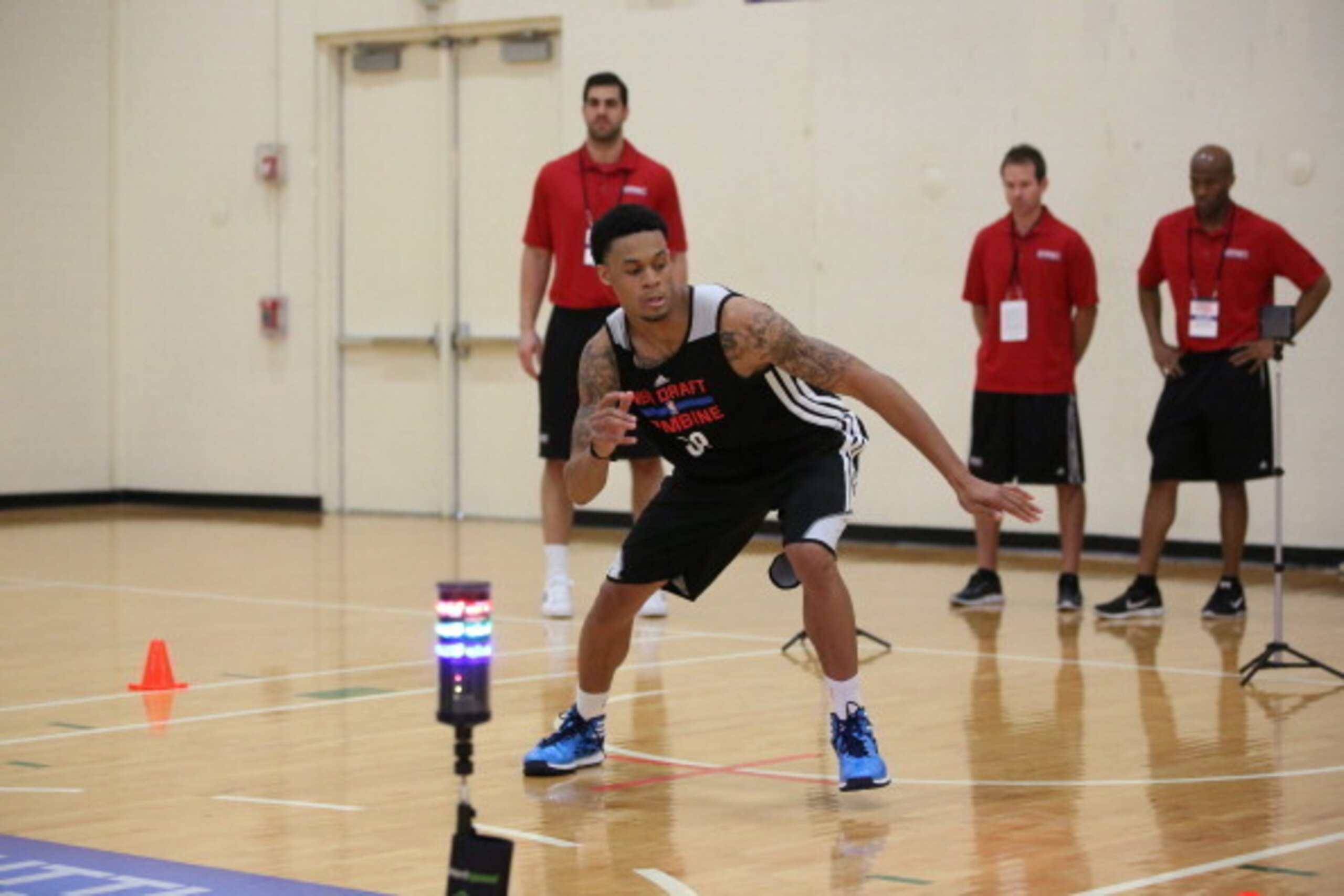 CHICAGO, IL - May 16: K.J. McDaniels participates in drills during the 2014 Draft Combine on May 16, 2014 at Quest Multisport in Chicago, Illinois. NOTE TO USER: User expressly acknowledges and agrees that, by downloading and or using this Photograph, CHICAGO, IL - May 16: K.J. McDaniels participates in drills during the 2014 Draft Combine on May 16, 2014 at Quest Multisport in Chicago, Illinois. NOTE TO USER: User expressly acknowledges and agrees that, by downloading and or using this Photograph,