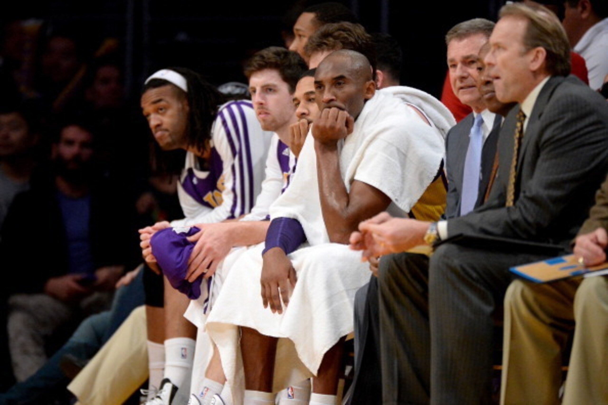 LOS ANGELES, CA - DECEMBER 08:  Kobe Bryant #24 of the Los Angeles Lakers watches play from the bench during a 116-94 loss to the Toronto Raptors at Staples Center on December 8, 2013 in Los Angeles, California.  NOTE TO USER: User expressly acknowledges 