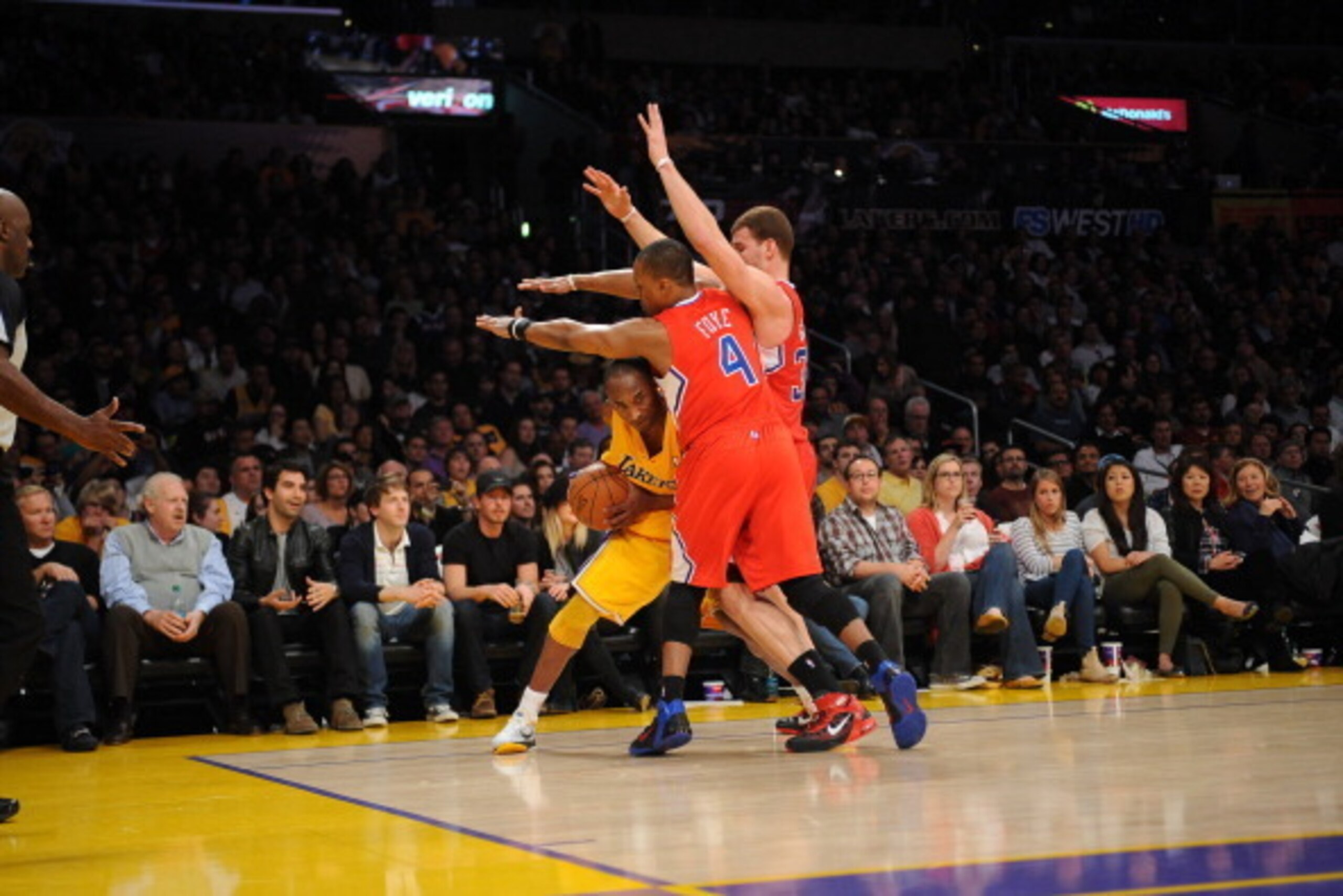 LOS ANGELES, CA - MARCH 25:  Kobe Bryant #24 of the Los Angeles Lakers is double-teamed by Randy Foye #4 and Blake Griffin #32 of the Los Angeles Clippers at Staples Center on March 25, 2011 in Los Angeles, California. NOTE TO USER: User expressly acknowl